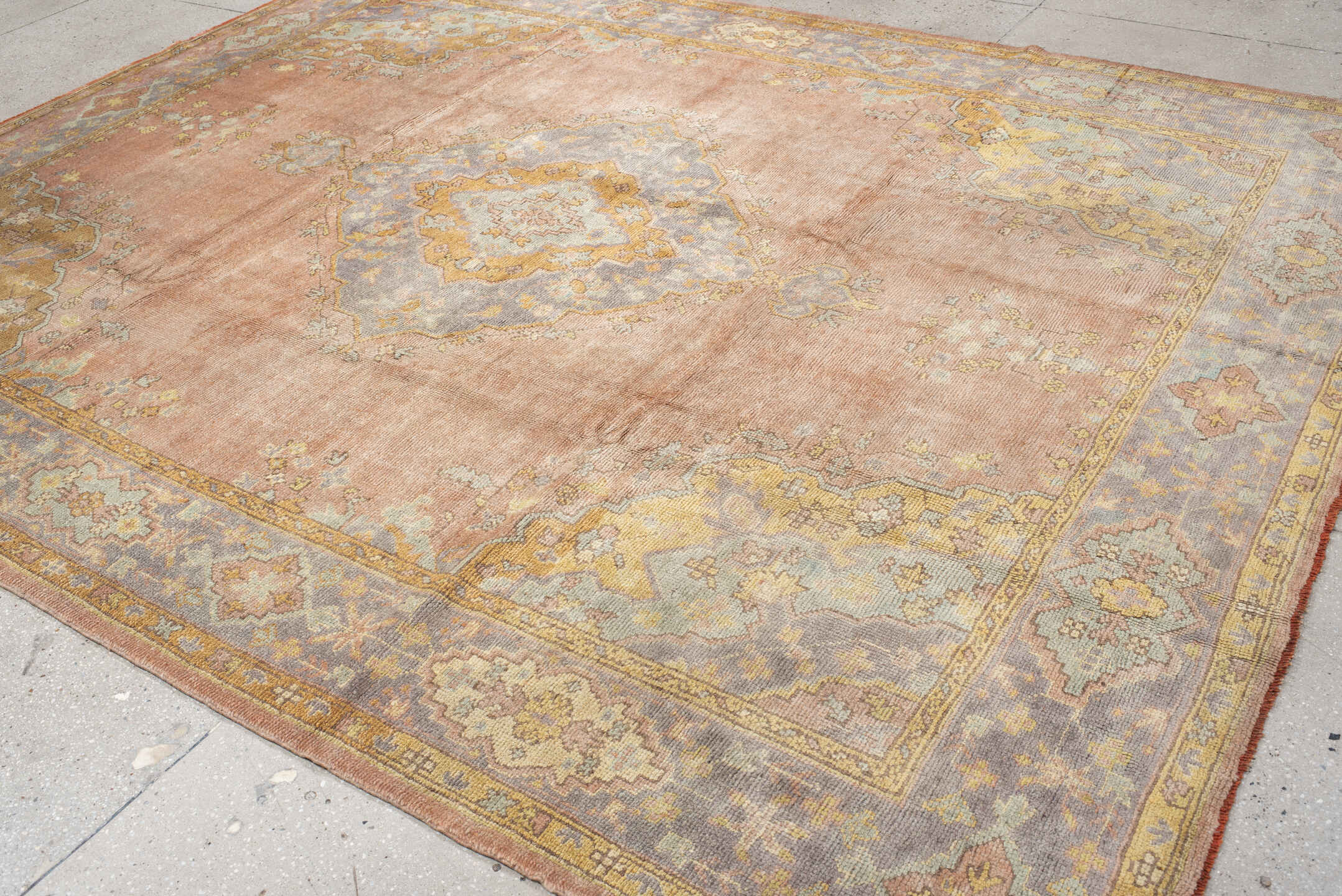 8' x 11' one-of-a-kind handmade antique Oushak large size rug. Color palette: blush, powder blue, gold, ivory, sage, peach