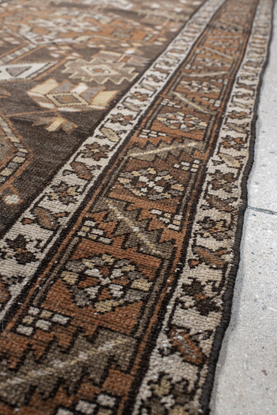 2' x 12' one-of-a-kind handmade vintage Karaje runner rug. Color palette: brown, taupe, rust, ivory, camel, charcoal, beige