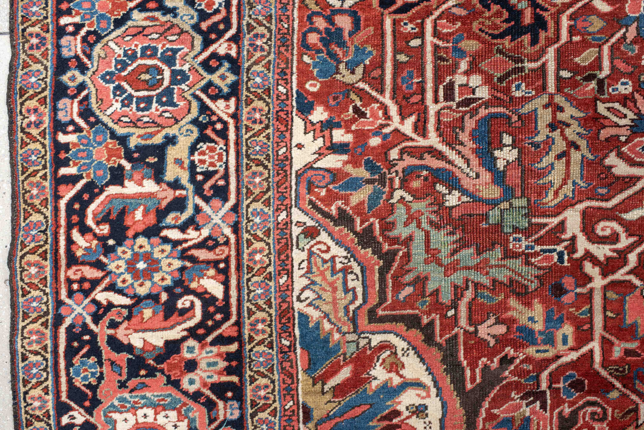 11' x 15' one-of-a-kind handmade vintage Heriz oversize rug. Color palette: rust, ivory, navy, sky_blue, rose, teal