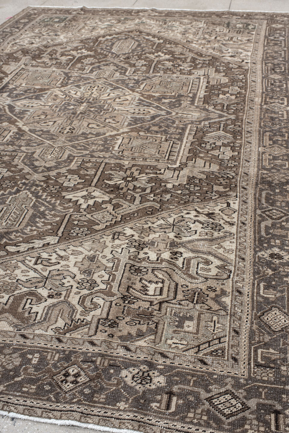 8' x 12' one-of-a-kind handmade vintage Heriz large size rug. Color palette: gray, brown, light gray, off-white, pink