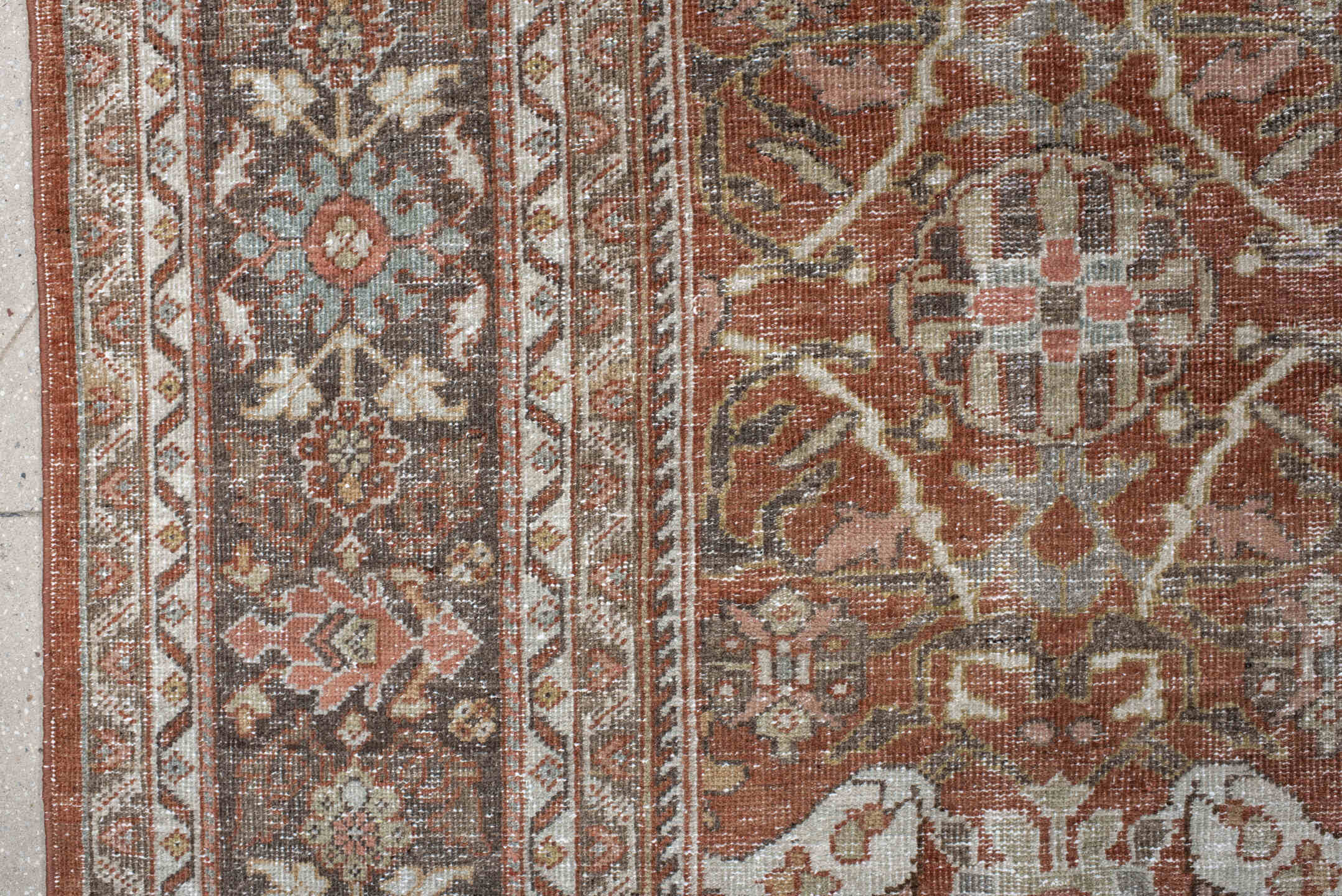 10' x 16' one-of-a-kind handmade antique Mahal rug. Color palette: terra cotta, taupe, brown, ivory, sage, slate, rose