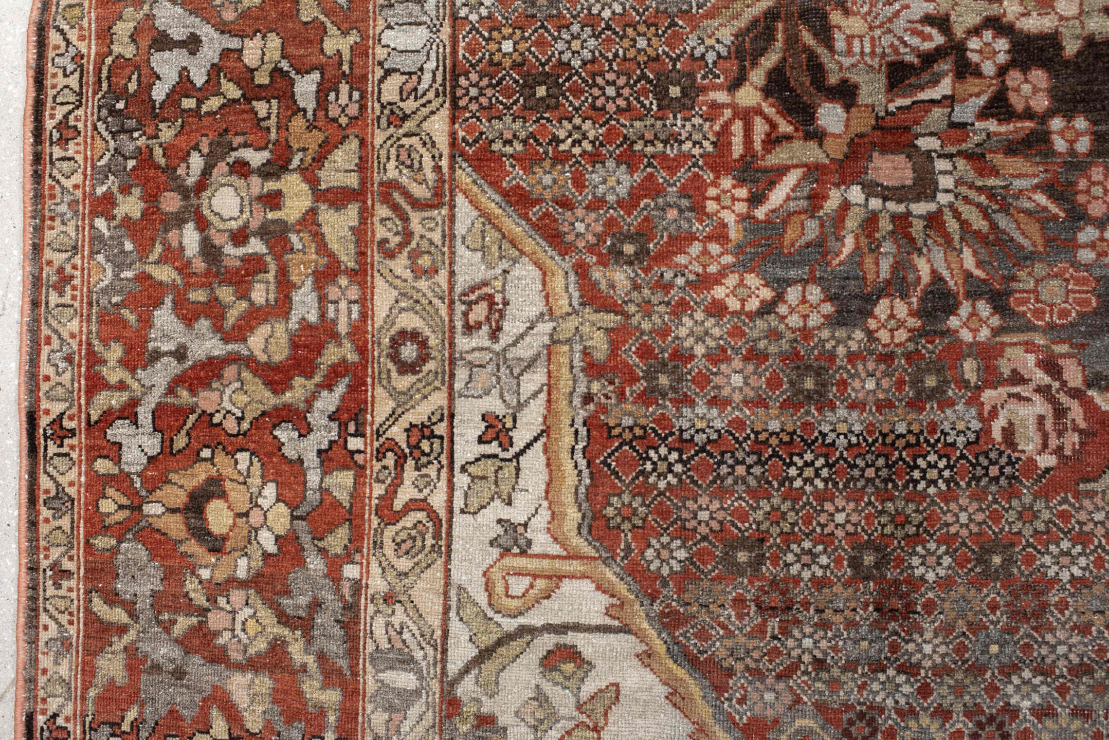 10' x 13' one-of-a-kind handmade vintage Baktiary large size rug. Color palette: brown, light gray, off-white, gray, pink