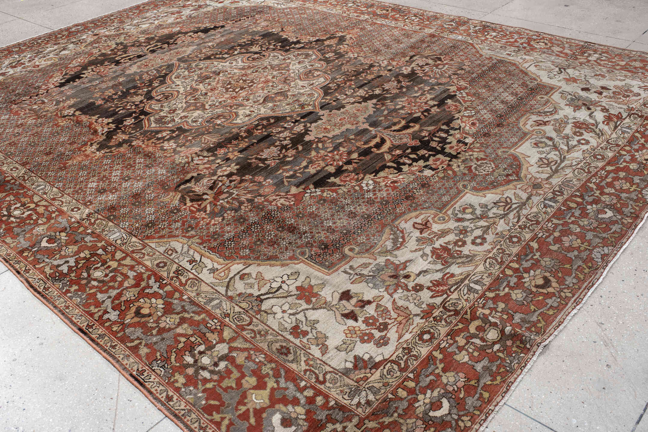 10' x 13' one-of-a-kind handmade antique Baktiary large size rug. Color palette: rust, charcoal, ivory, taupe, terra cotta