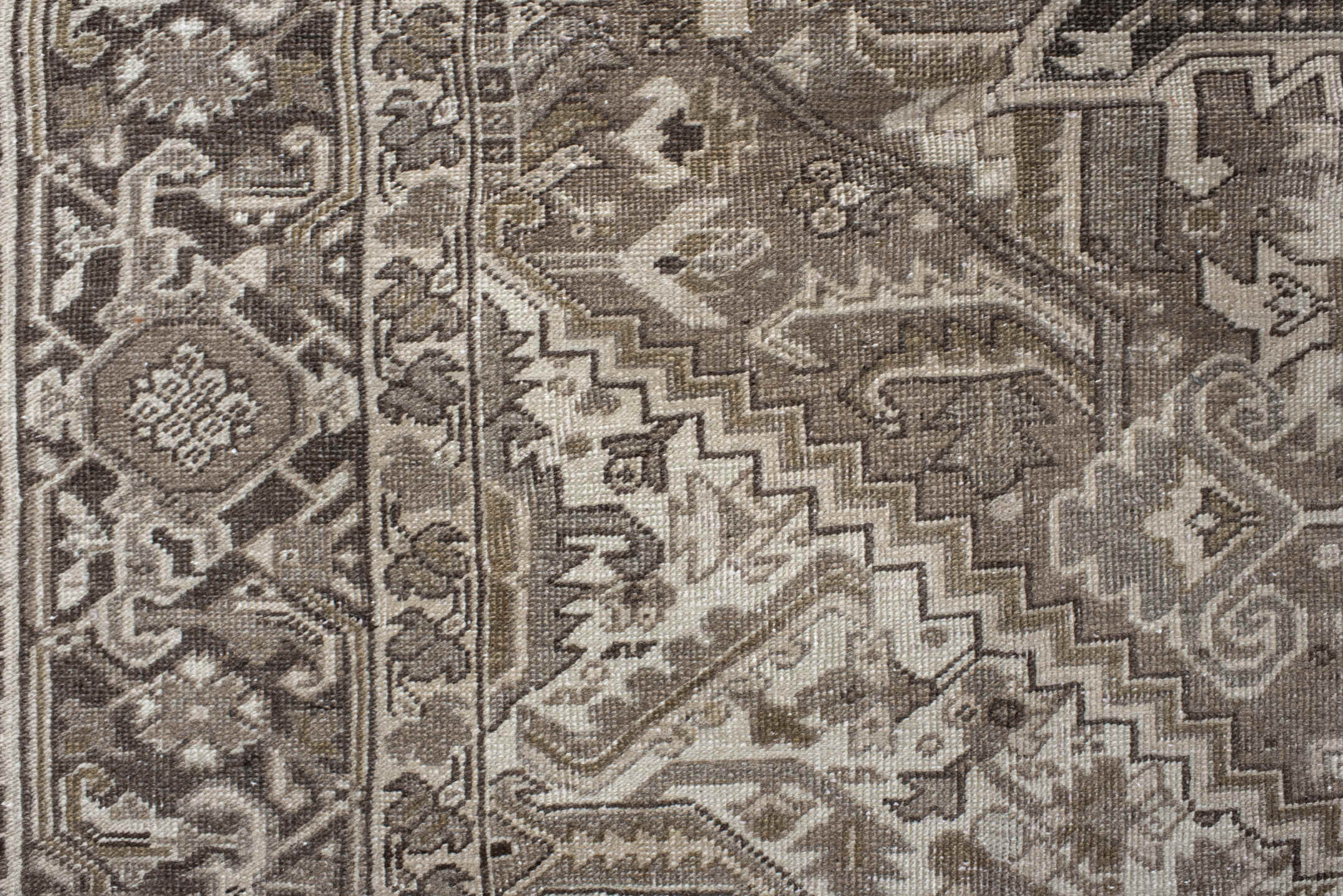 9' x 12' one-of-a-kind handmade antique Heriz large size rug. Color palette: taupe, ivory, brown, camel, charcoal, beige