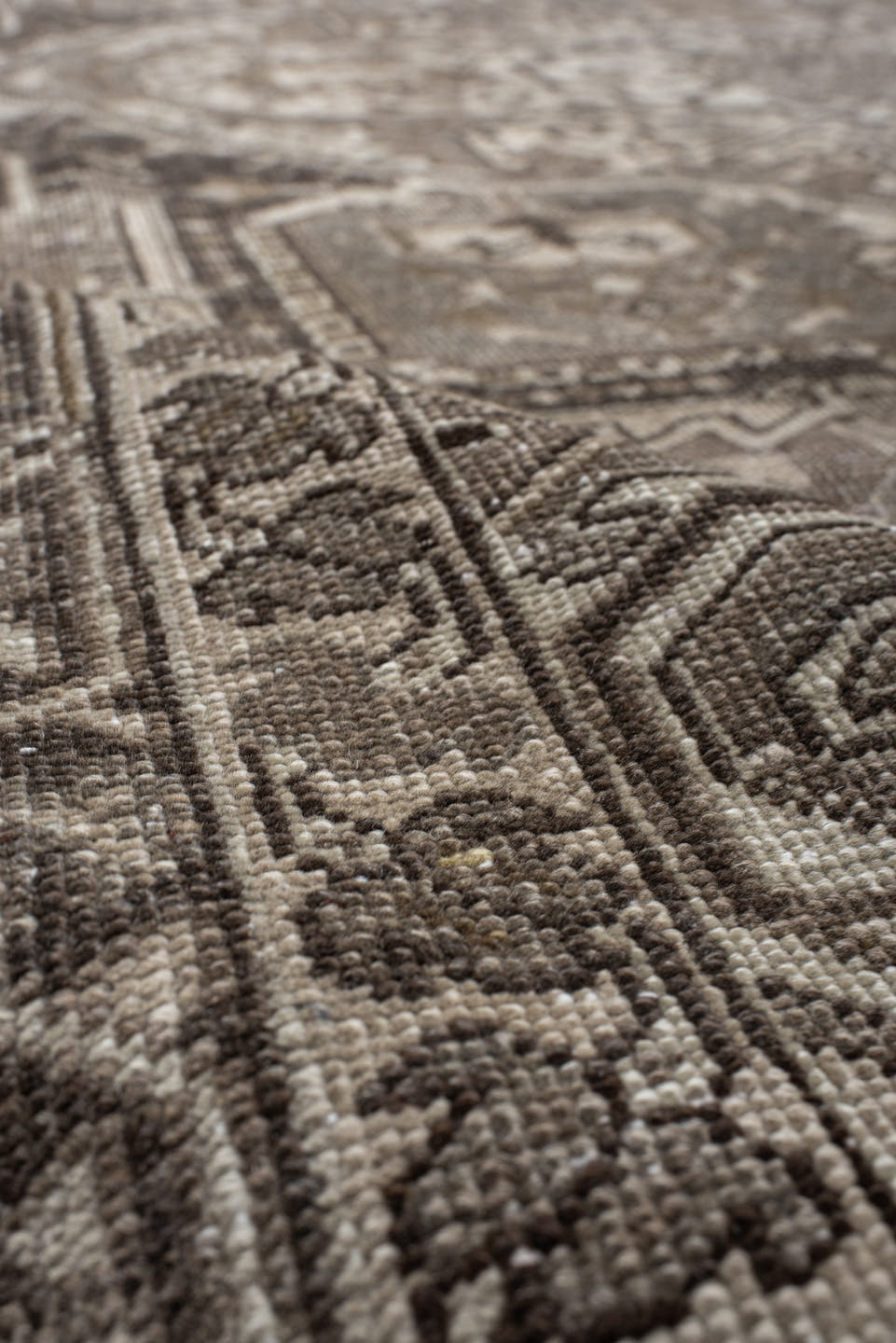 9' x 12' one-of-a-kind handmade antique Heriz large size rug. Color palette: taupe, ivory, brown, camel, charcoal, beige