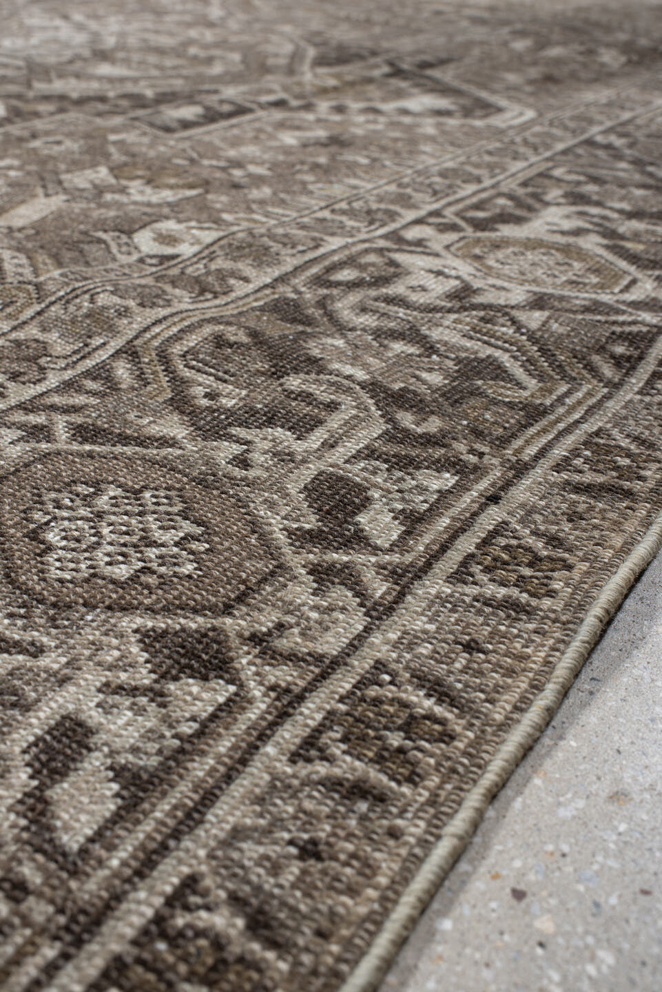 9' x 12' one-of-a-kind handmade antique Heriz large size rug. Color palette: taupe, ivory, brown, camel, charcoal, beige