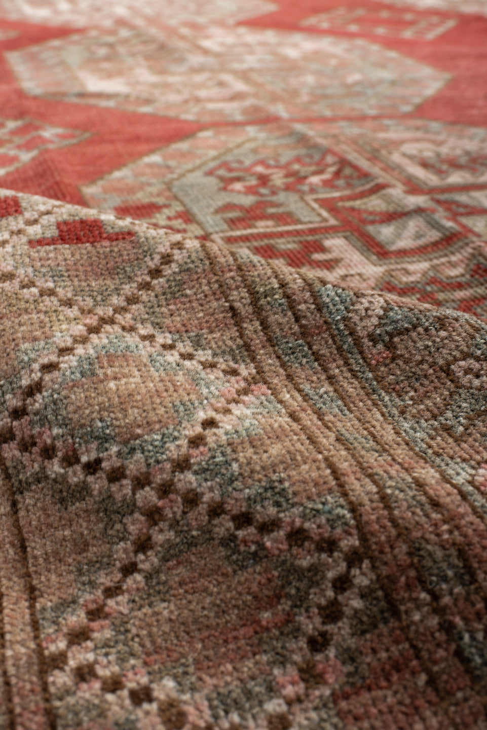 8' x 12' one-of-a-kind handmade antique Afghan large size rug. Color palette: rust, ivory, rose, sage, terra cotta, taupe