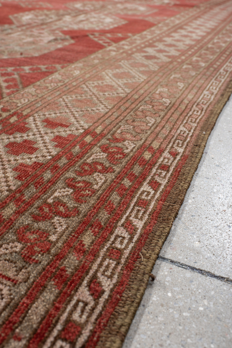 8' x 12' one-of-a-kind handmade antique Afghan large size rug. Color palette: rust, ivory, rose, sage, terra cotta, taupe