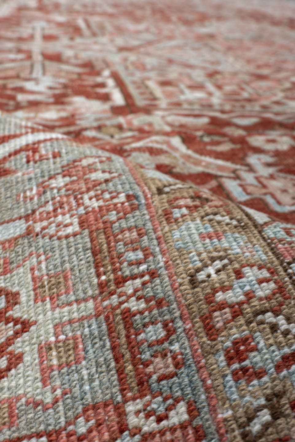 8' x 11' one-of-a-kind handmade vintage Heriz large size rug. Color palette: rust, pale blue, ivory, terra cotta, taupe