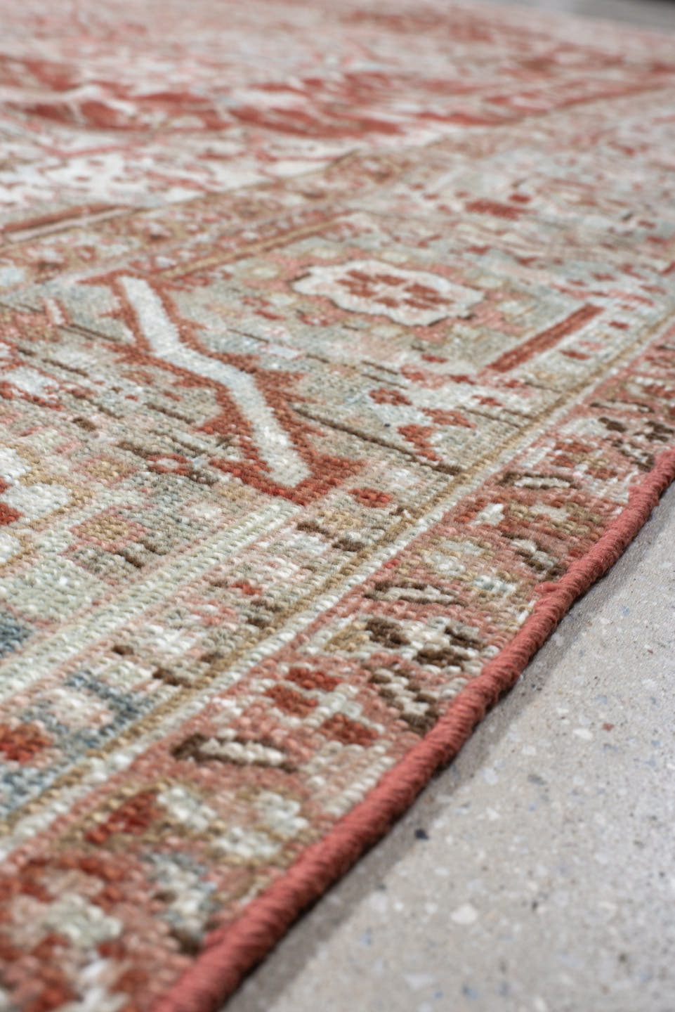 8' x 11' one-of-a-kind handmade vintage Heriz large size rug. Color palette: rust, pale blue, ivory, terra cotta, taupe