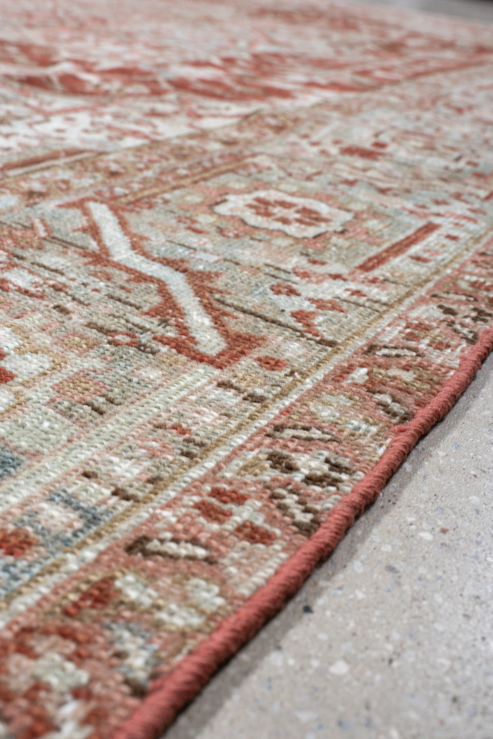 8' x 11' one-of-a-kind handmade vintage Heriz large size rug. Color palette: rust, pale blue, ivory, terra cotta, taupe