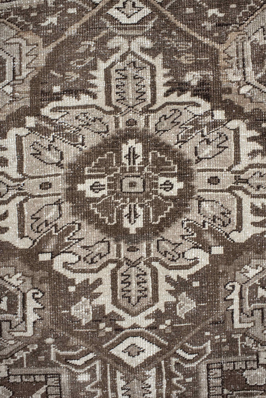 7' x 10' one-of-a-kind handmade antique Heriz large size rug. Color palette: taupe, brown, ivory, charcoal, camel, beige