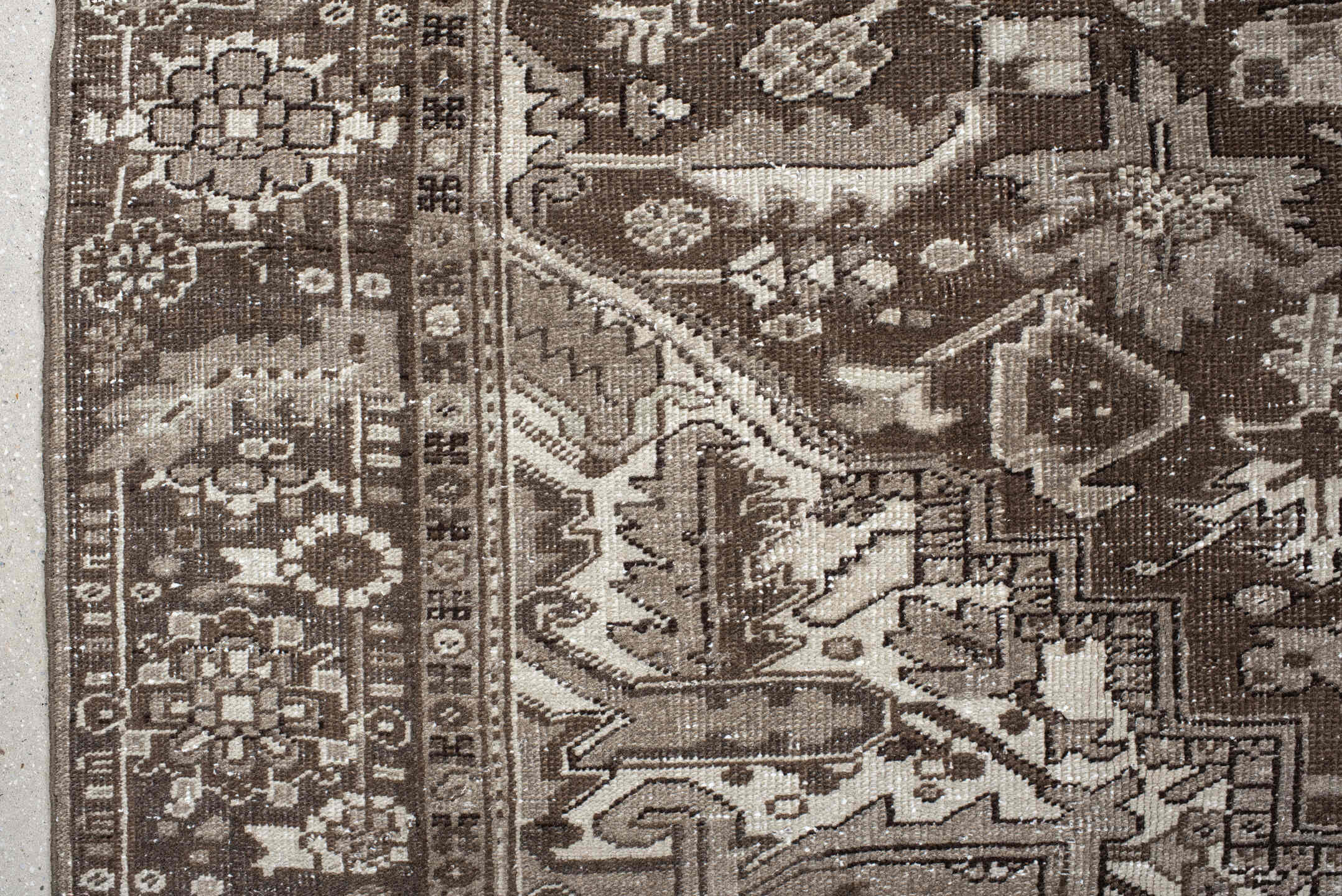 7' x 10' one-of-a-kind handmade antique Heriz large size rug. Color palette: taupe, brown, ivory, charcoal, camel, beige