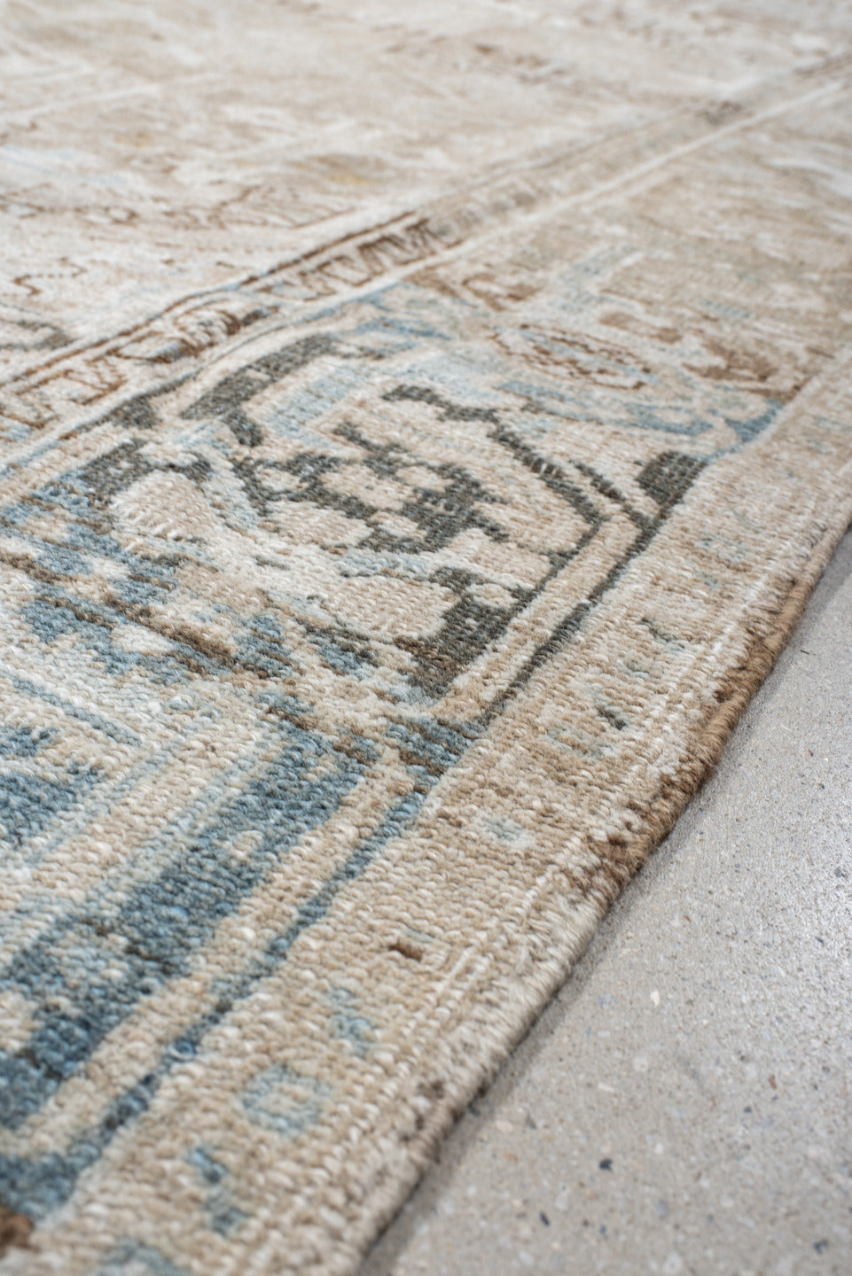 8' x 9' one-of-a-kind handmade vintage Heriz rug. Color palette: gray, off-white, light gray, pink, brown, dark gray