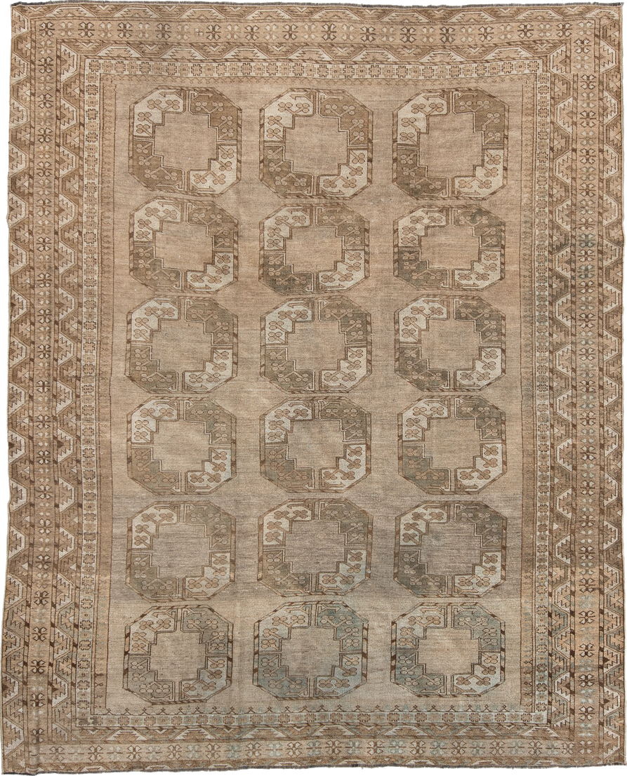 7' x 9' one-of-a-kind handmade vintage Afghan rug. Color palette: brown, gray, light gray, off-white, orange