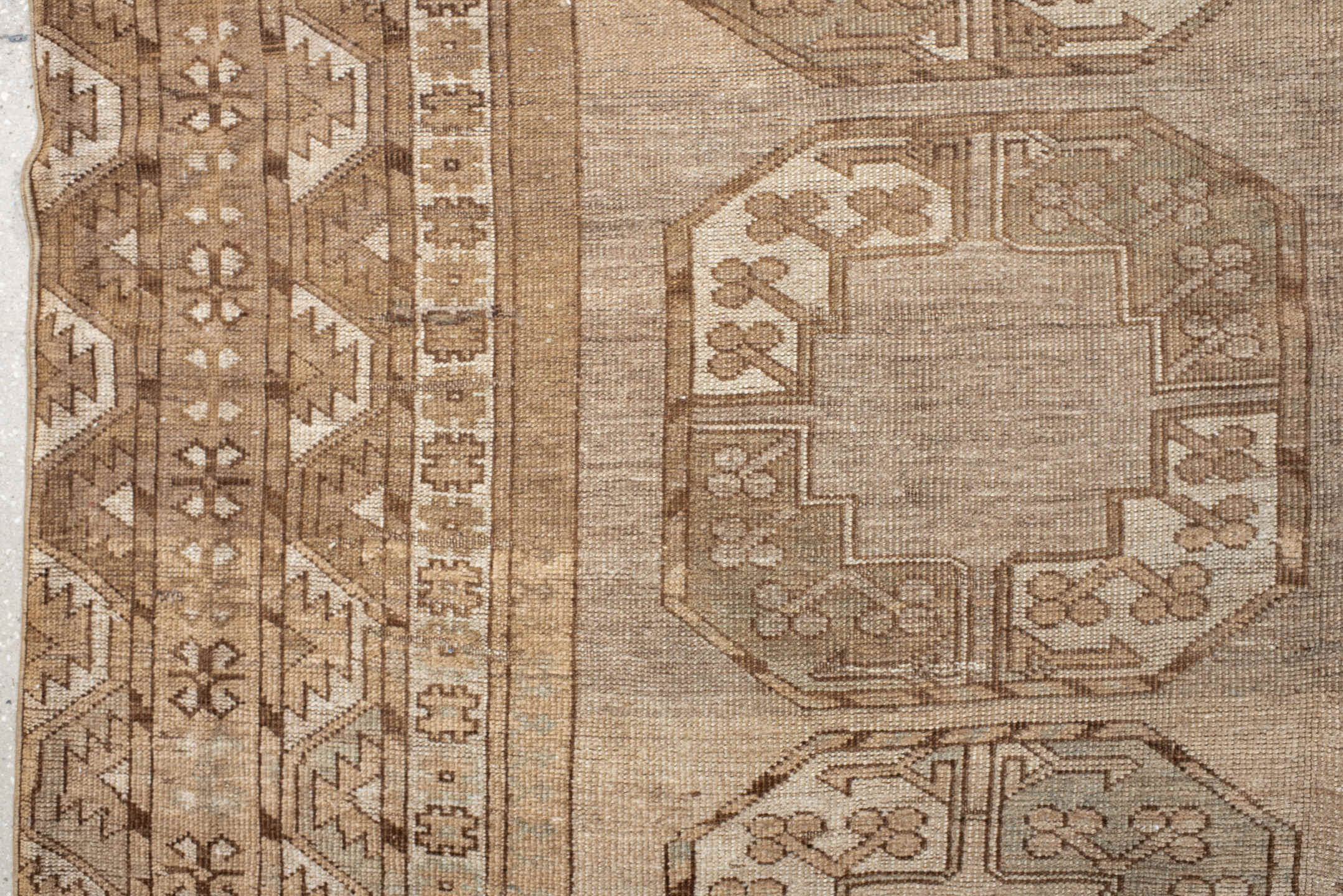 7' x 9' one-of-a-kind handmade antique Afghan rug. Color palette: taupe, camel, beige, ivory, sand, light brown, pale blue
