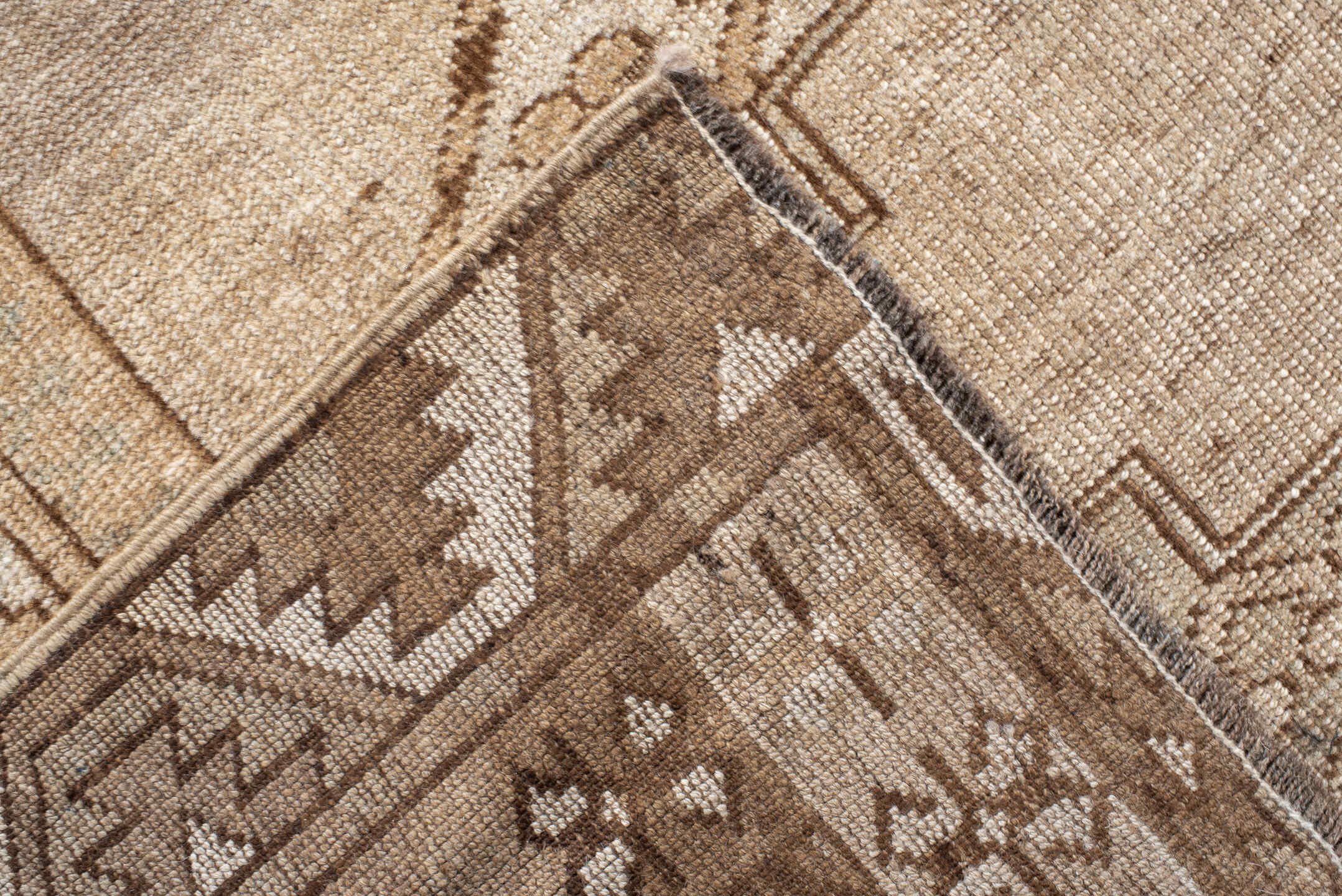 7' x 9' one-of-a-kind handmade antique Afghan rug. Color palette: taupe, camel, beige, ivory, sand, light brown, pale blue