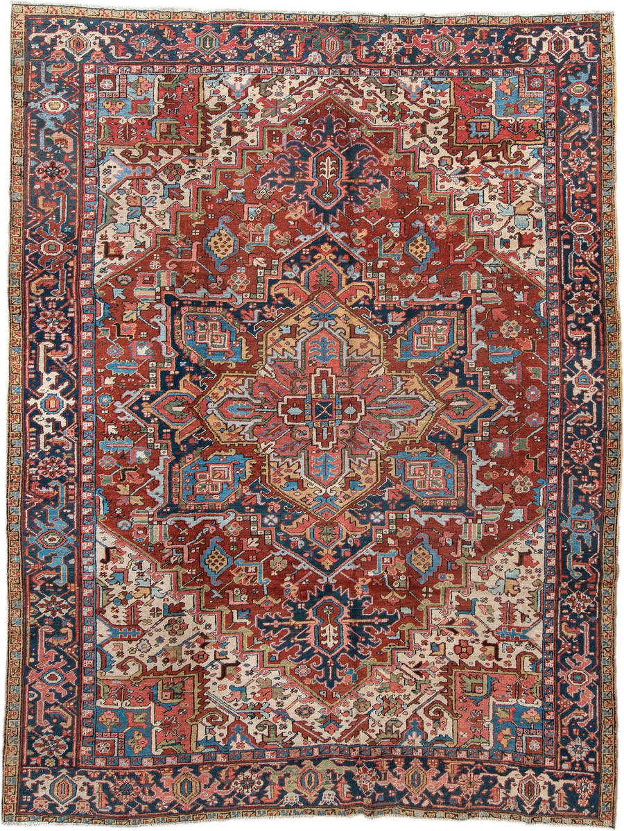 8' x 10' one-of-a-kind handmade antique Heriz large size rug. Color palette: rust, navy, ivory, sky blue, camel, coral, sage