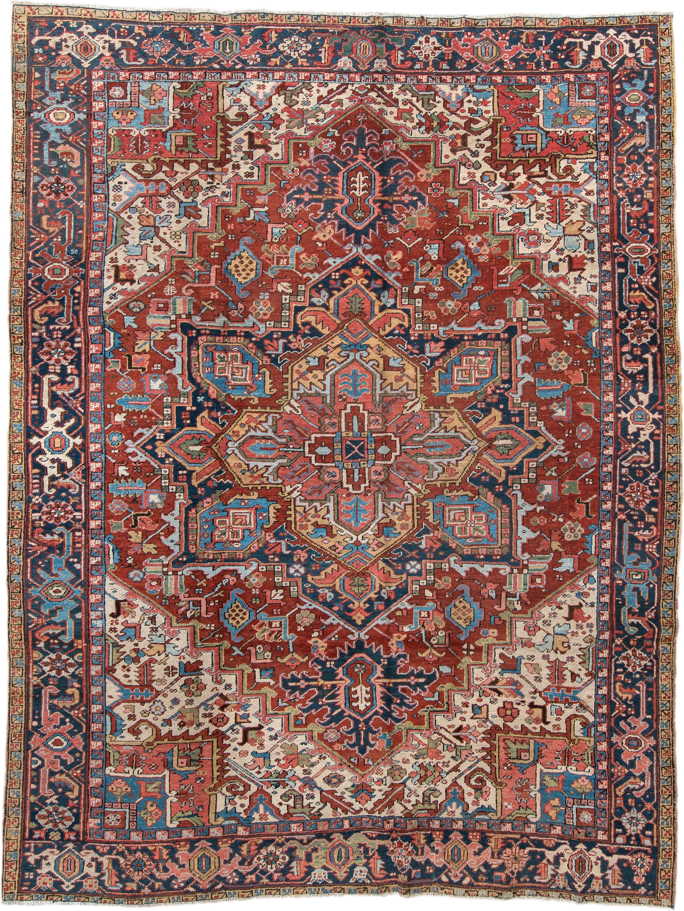 8' x 10' one-of-a-kind handmade antique Heriz large size rug. Color palette: rust, navy, ivory, sky blue, camel, coral, sage