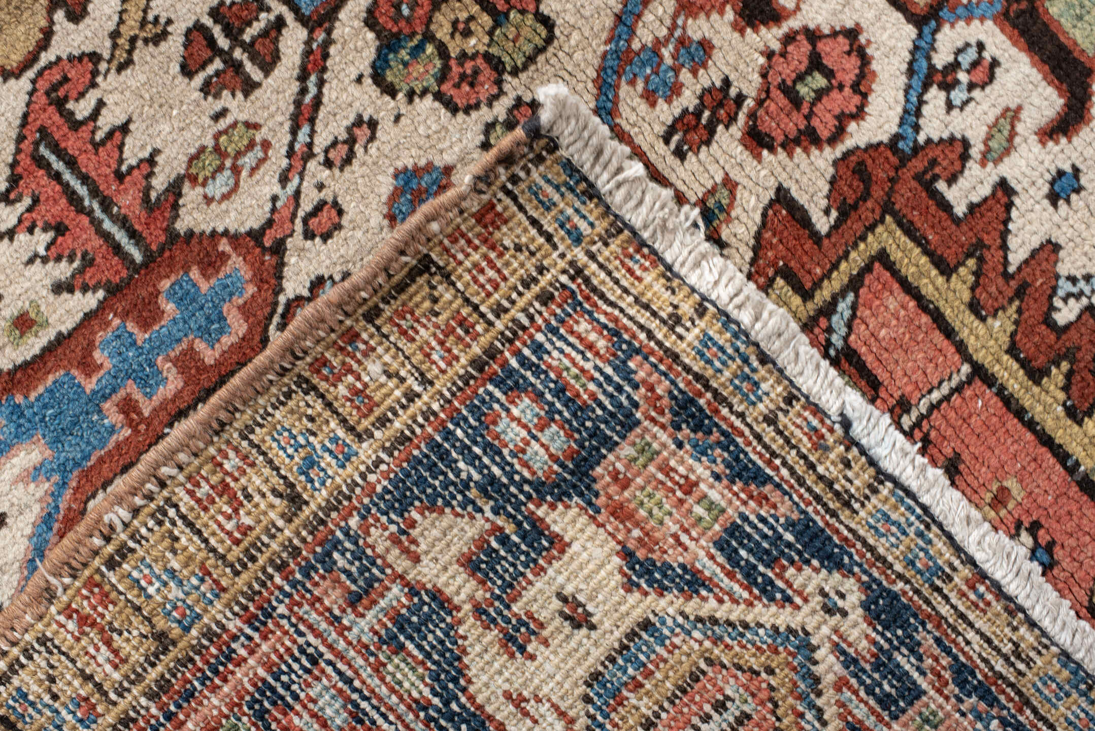 8' x 10' one-of-a-kind handmade antique Heriz large size rug. Color palette: rust, navy, ivory, sky blue, camel, coral, sage