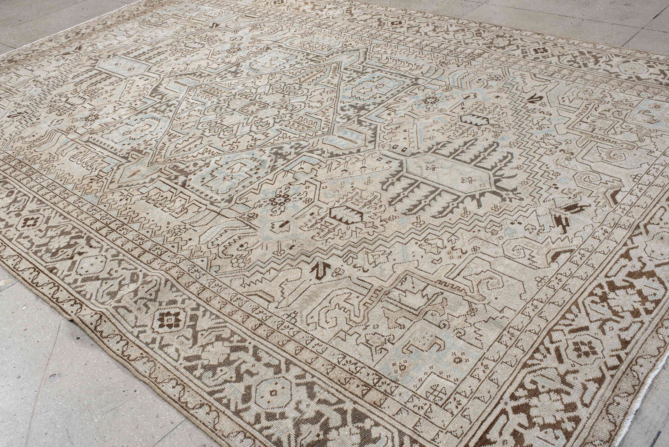 9' x 13' one-of-a-kind handmade antique Heriz large size rug. Color palette: ivory, taupe, brown, pale_blue, cream, gray