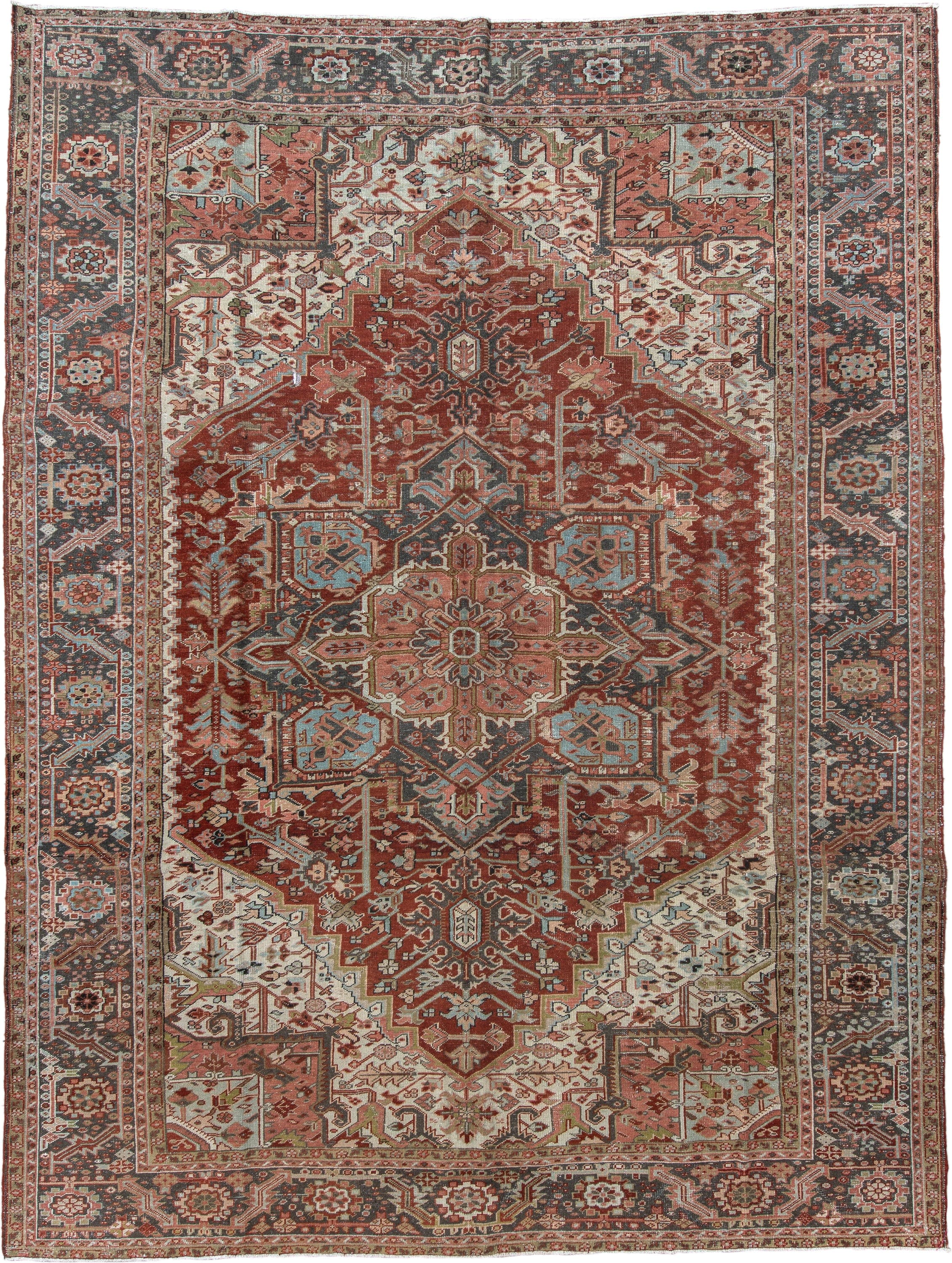 9' x 12' one-of-a-kind handmade antique Heriz large size rug. Color palette: rust, ivory, navy, terra cotta, sage, camel