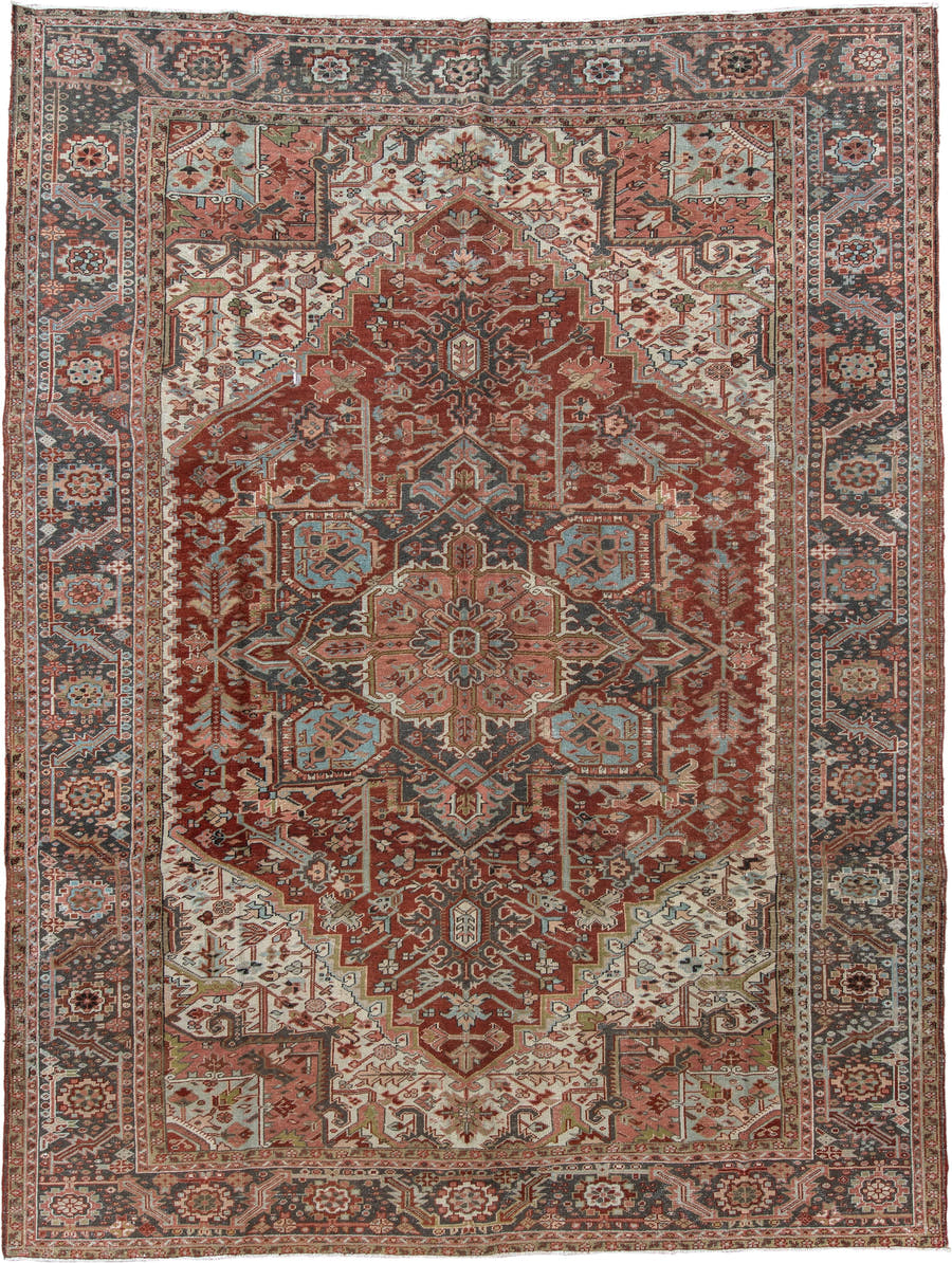 9' x 12' one-of-a-kind handmade antique Heriz large size rug. Color palette: rust, ivory, navy, terra cotta, sage, camel