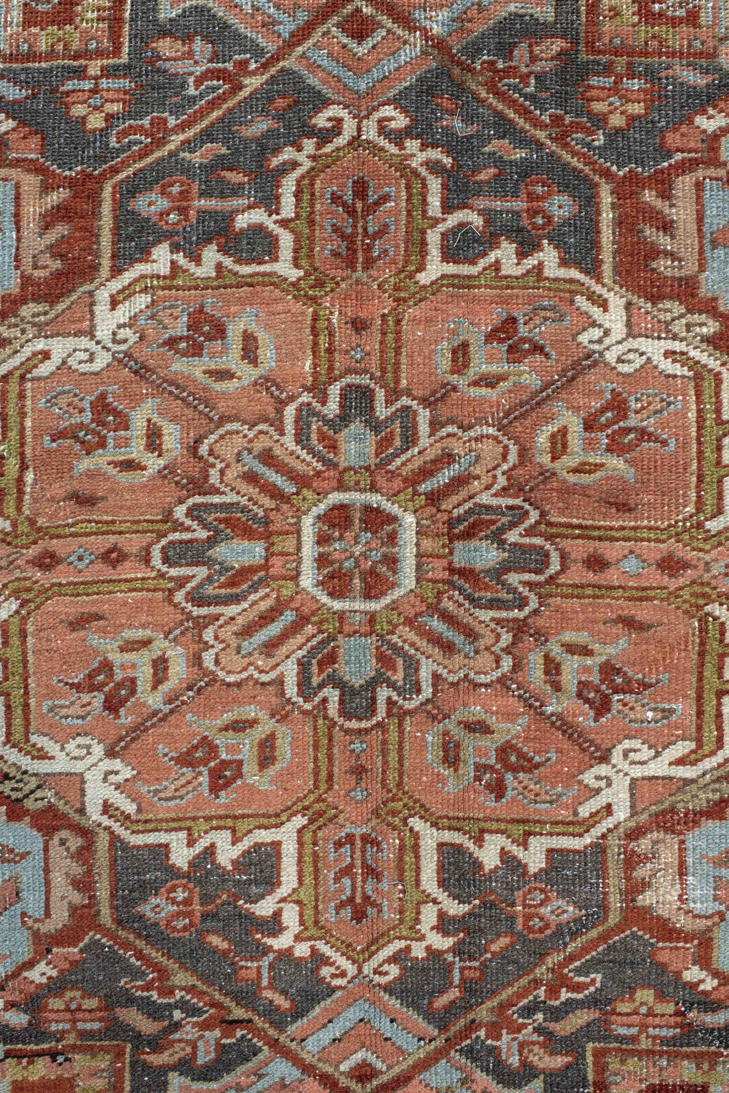 9' x 12' one-of-a-kind handmade antique Heriz large size rug. Color palette: rust, ivory, navy, terra cotta, sage, camel