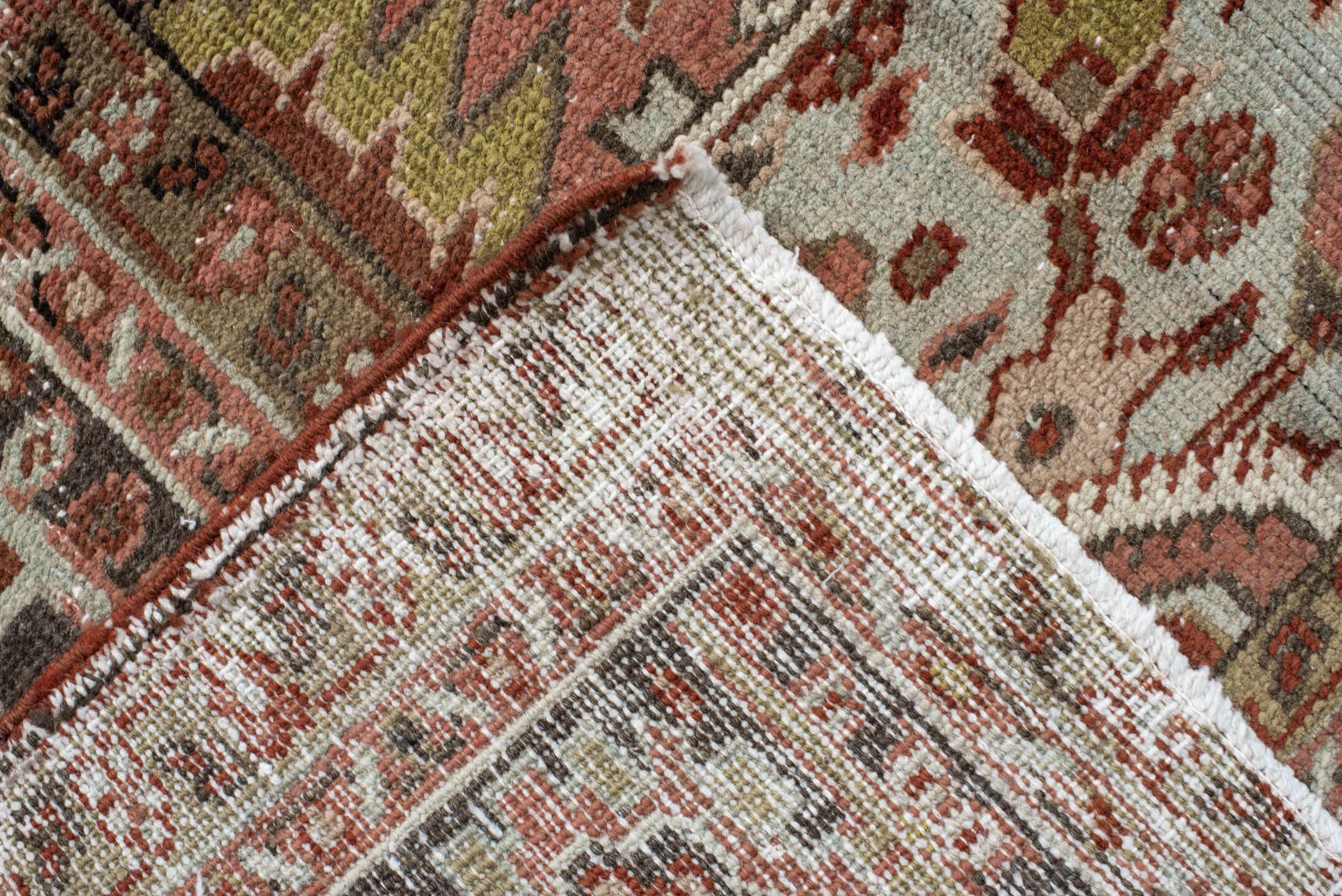 9' x 12' one-of-a-kind handmade antique Heriz large size rug. Color palette: rust, ivory, navy, terra cotta, sage, camel
