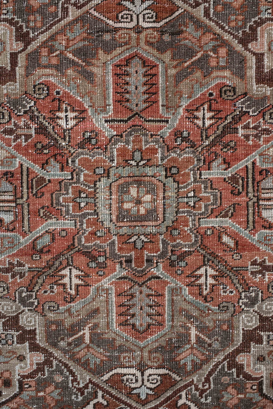9' x 12' one-of-a-kind handmade antique Heriz large size rug. Color palette: rust, ivory, charcoal, taupe, terra cotta