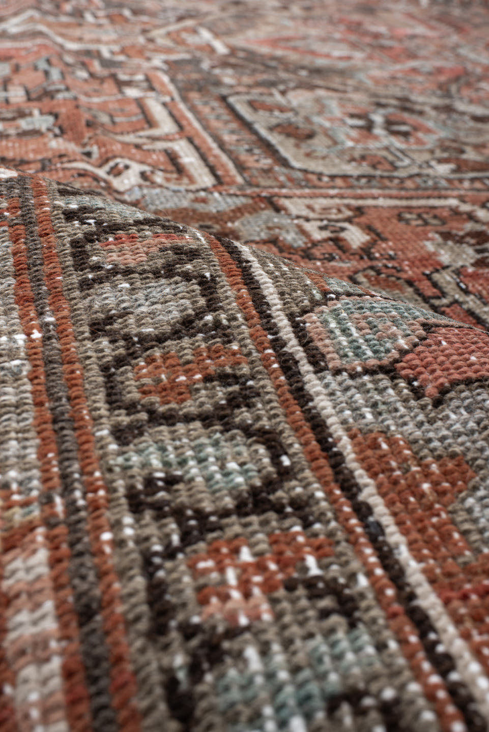 9' x 12' one-of-a-kind handmade antique Heriz large size rug. Color palette: rust, ivory, charcoal, taupe, terra cotta