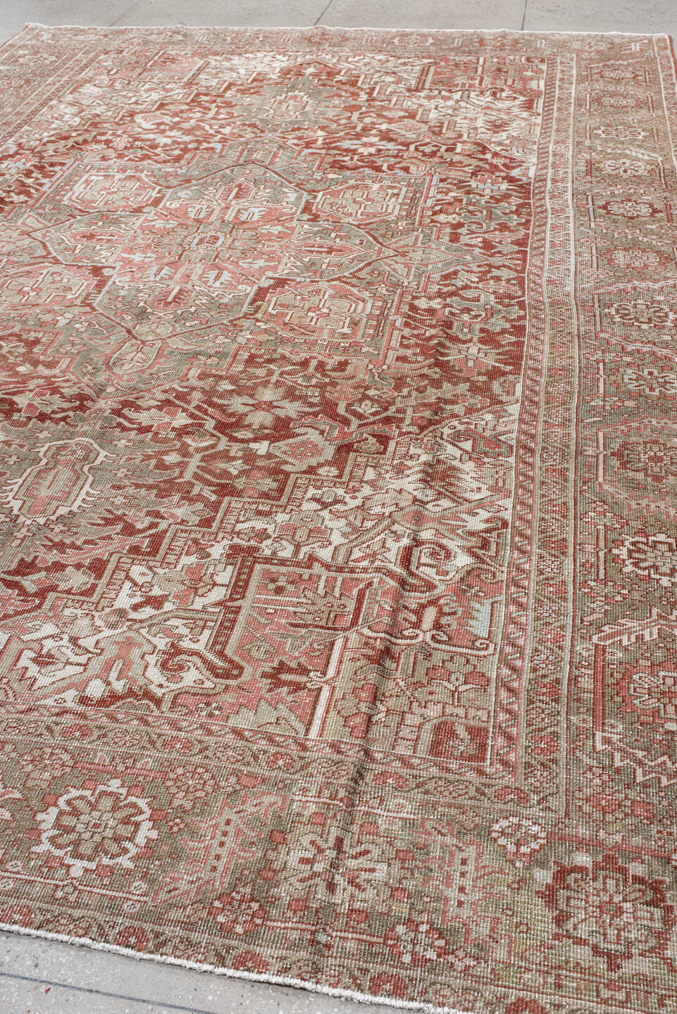 9' x 13' one-of-a-kind handmade vintage Heriz large size rug. Color palette: rust, sage, ivory, taupe, rose, brown