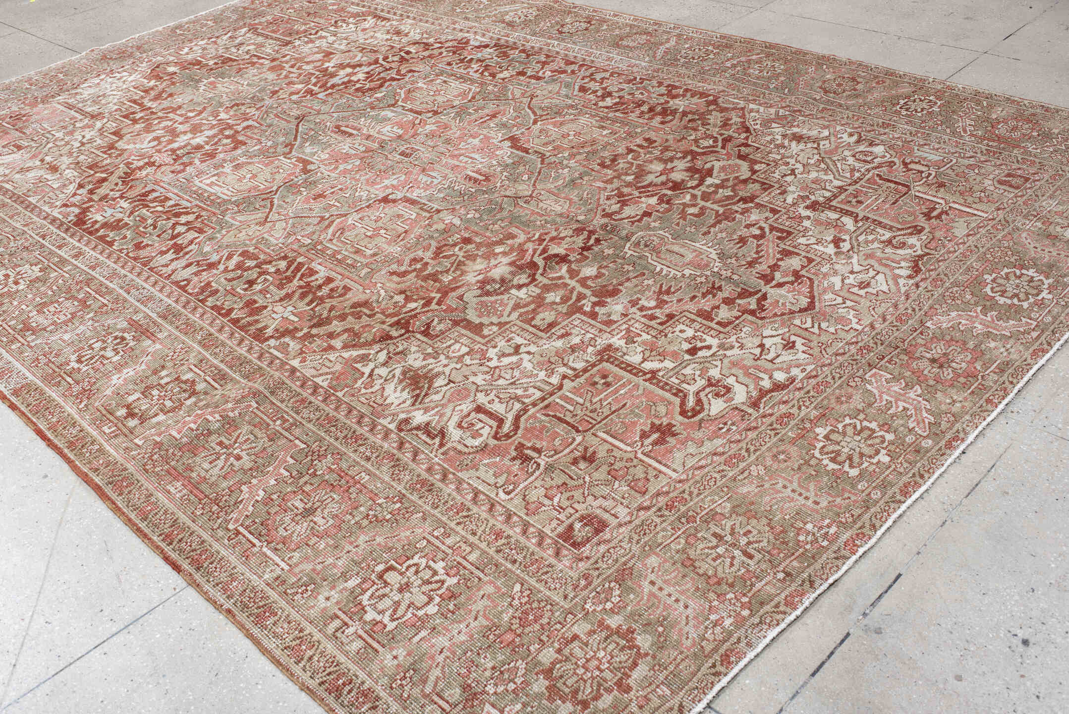 9' x 13' one-of-a-kind handmade vintage Heriz large size rug. Color palette: rust, sage, ivory, taupe, rose, brown