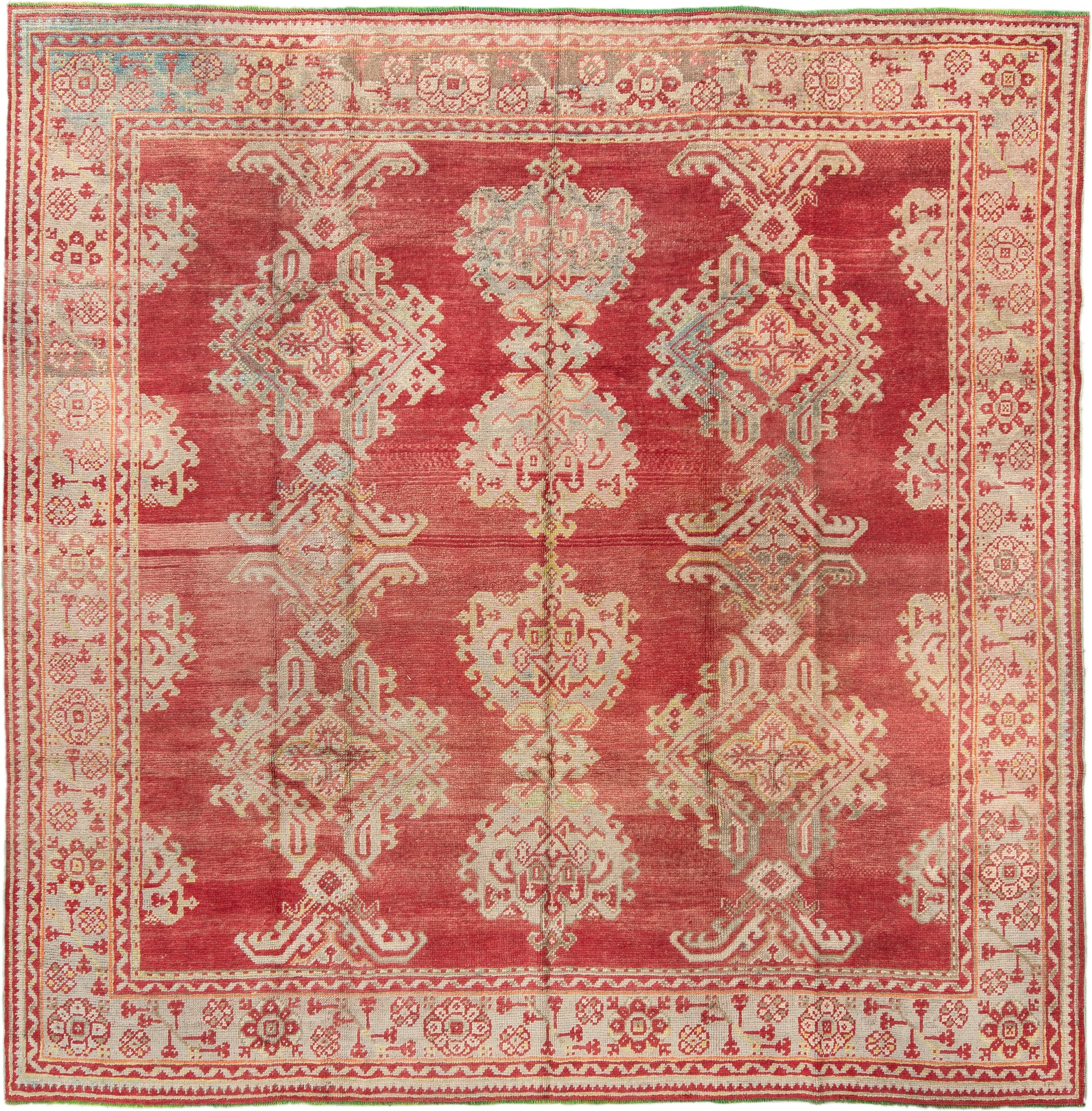 9' x 9' one-of-a-kind handmade antique Oushak rug. Color palette: terra cotta, ivory, rose, salmon, beige, sage, terracotta