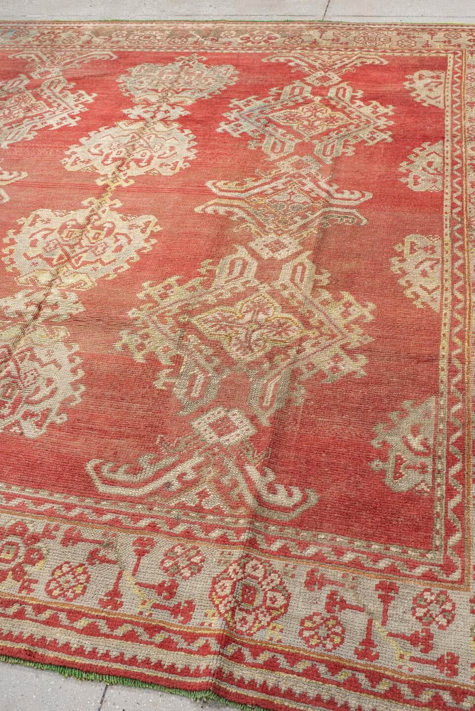 9' x 9' one-of-a-kind handmade antique Oushak rug. Color palette: terra cotta, ivory, rose, salmon, beige, sage, terracotta