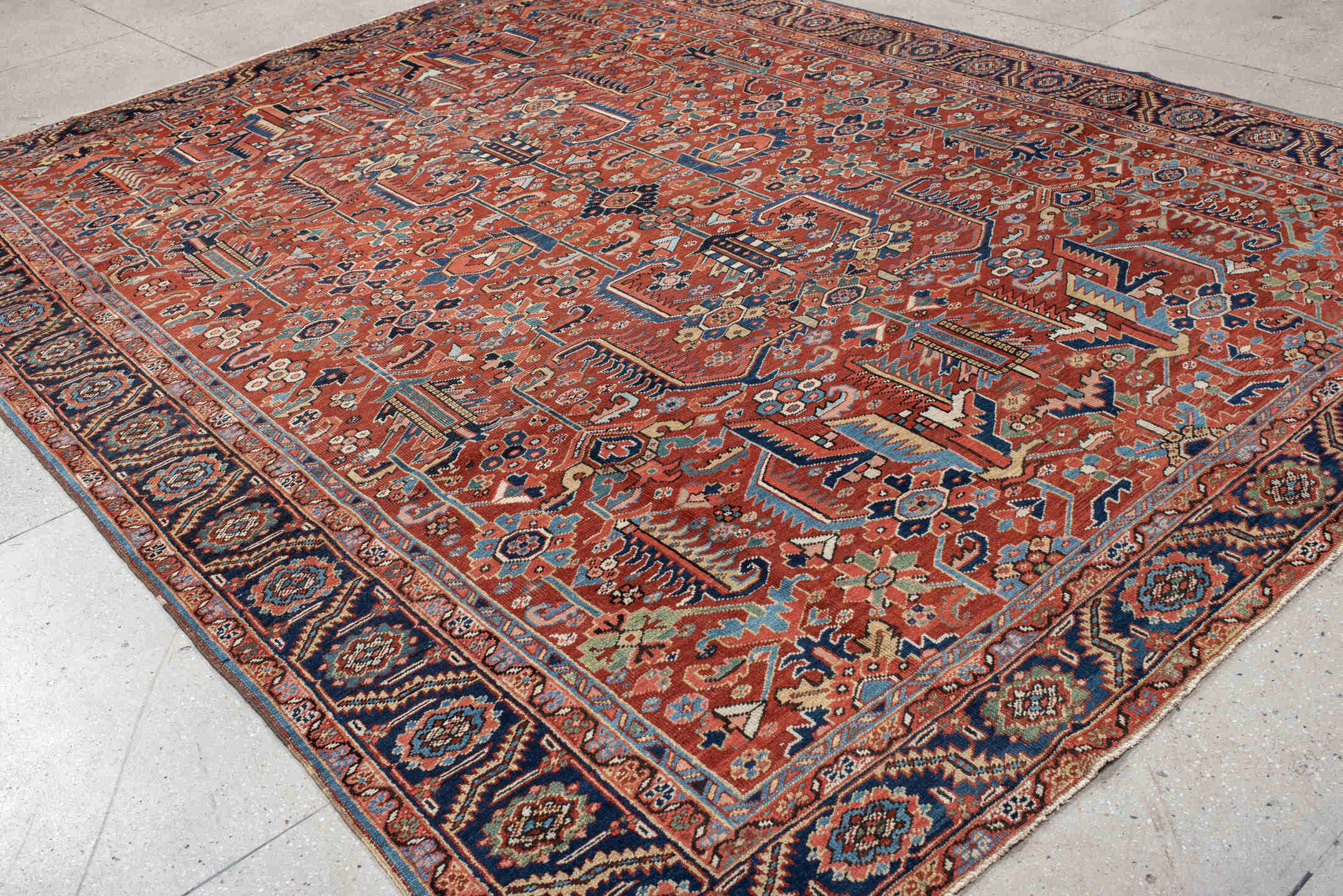 9' x 12' one-of-a-kind handmade antique Heriz large size rug. Color palette: rust, navy, ivory, sky_blue, coral, sage, camel