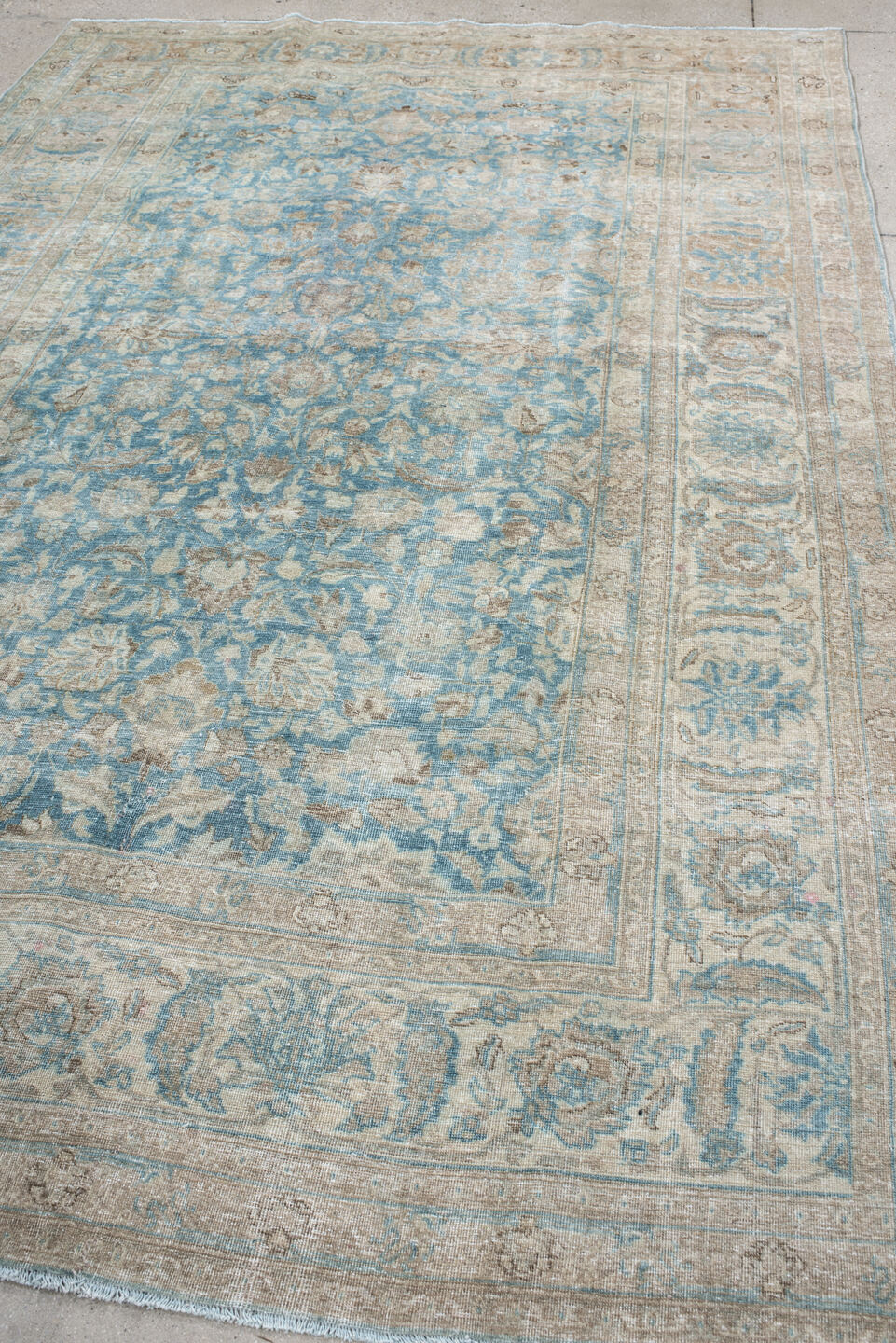 6' x 9' one-of-a-kind handmade antique Tabriz medium size rug. Color palette: ivory, sky blue, beige, taupe, camel