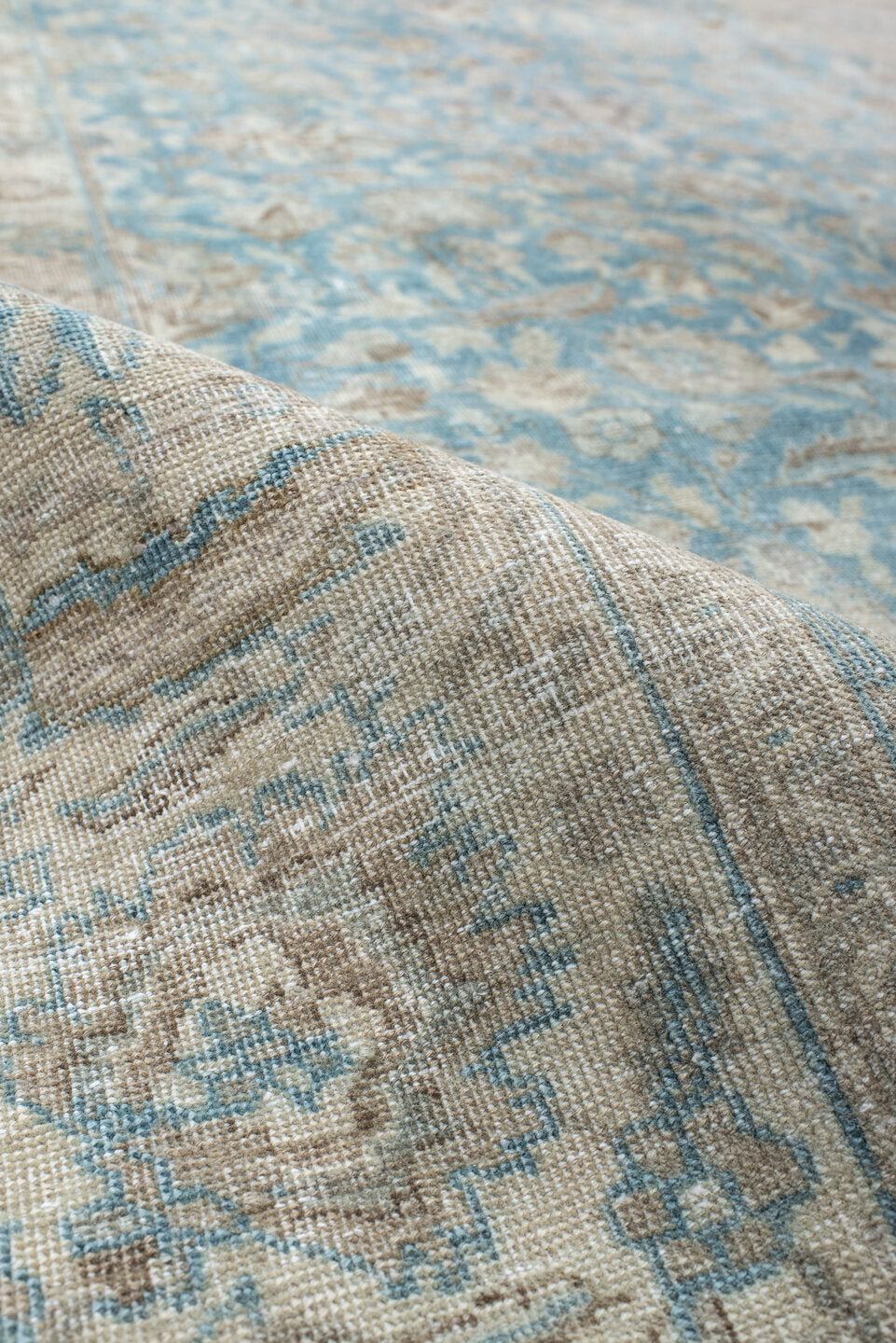 6' x 9' one-of-a-kind handmade antique Tabriz medium size rug. Color palette: ivory, sky blue, beige, taupe, camel