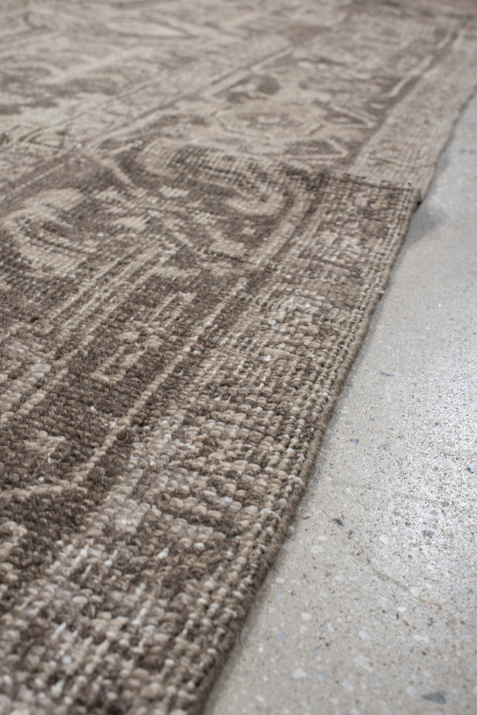 7' x 10' one-of-a-kind handmade antique Heriz large size rug. Color palette: taupe, brown, ivory, charcoal, beige, gray