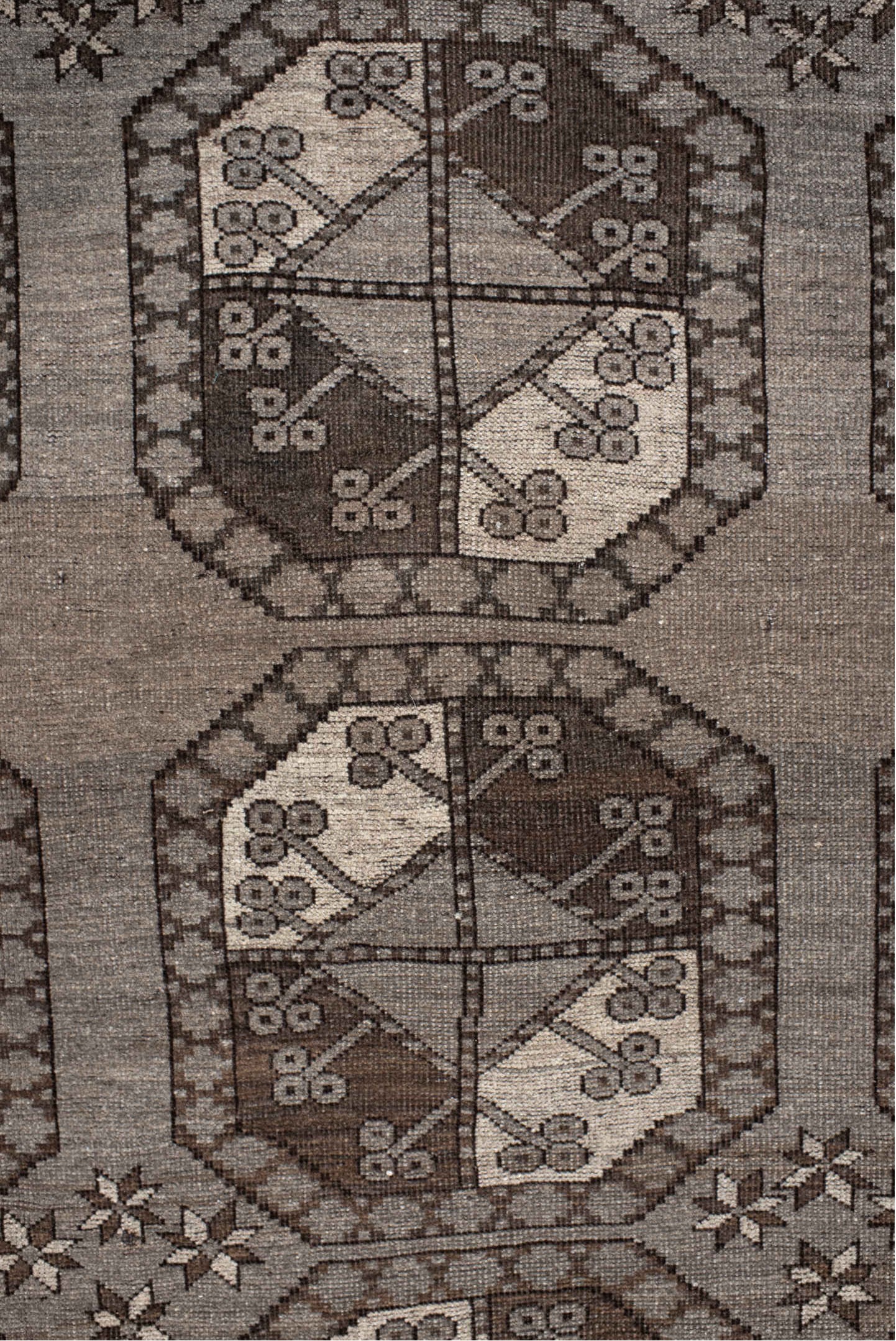 7' x 10' one-of-a-kind handmade vintage Afghan large size rug. Color palette: black, brown, gray, light gray, off-white