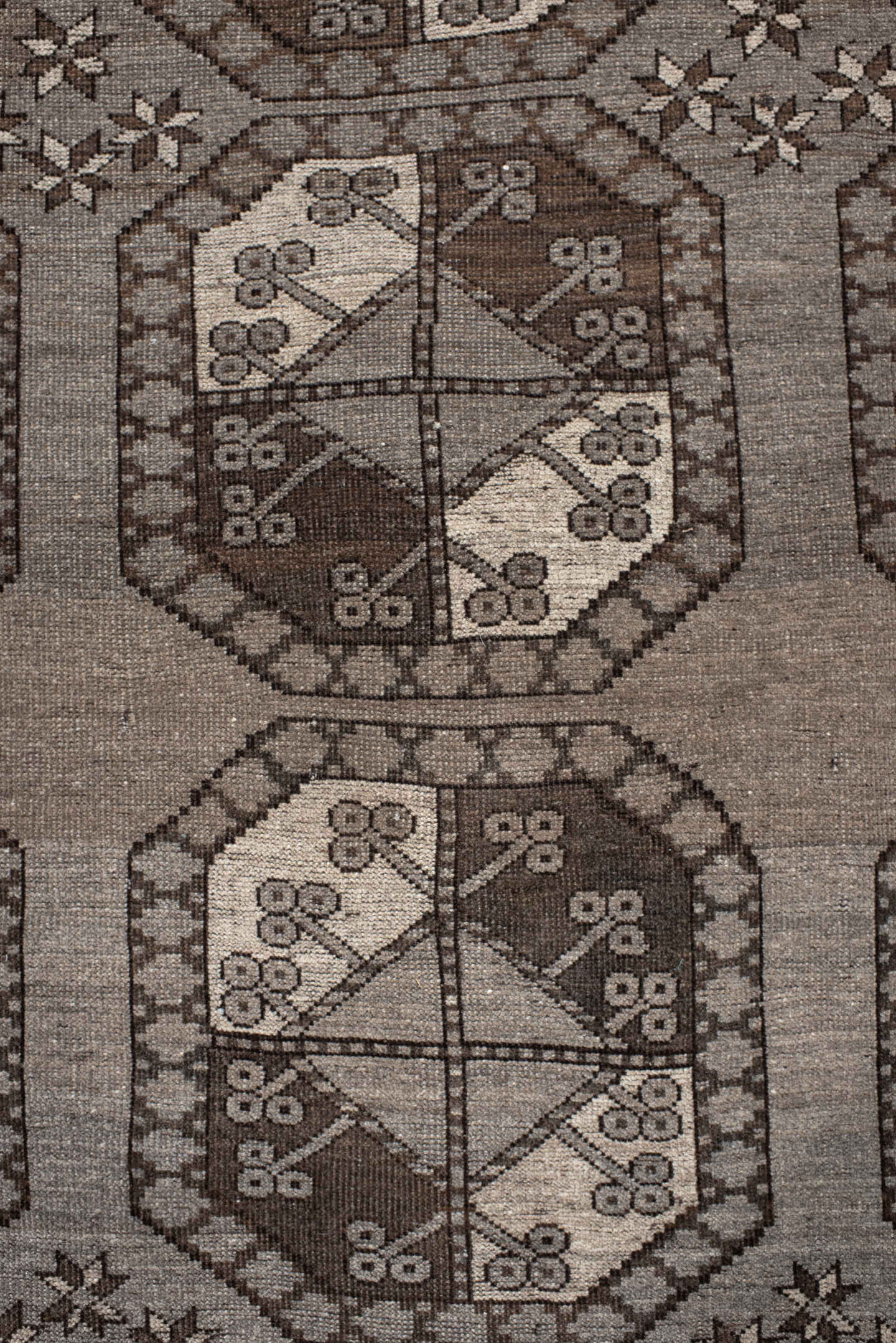 7' x 10' one-of-a-kind handmade antique Afghan large size rug. Color palette: taupe, brown, ivory, charcoal, camel, beige