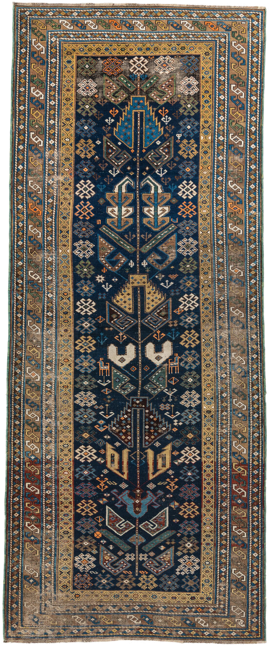 3' x 9' one-of-a-kind handmade vintage Shirvan runner rug. Color palette: navy, camel, ivory, sky blue, taupe, rust, sage