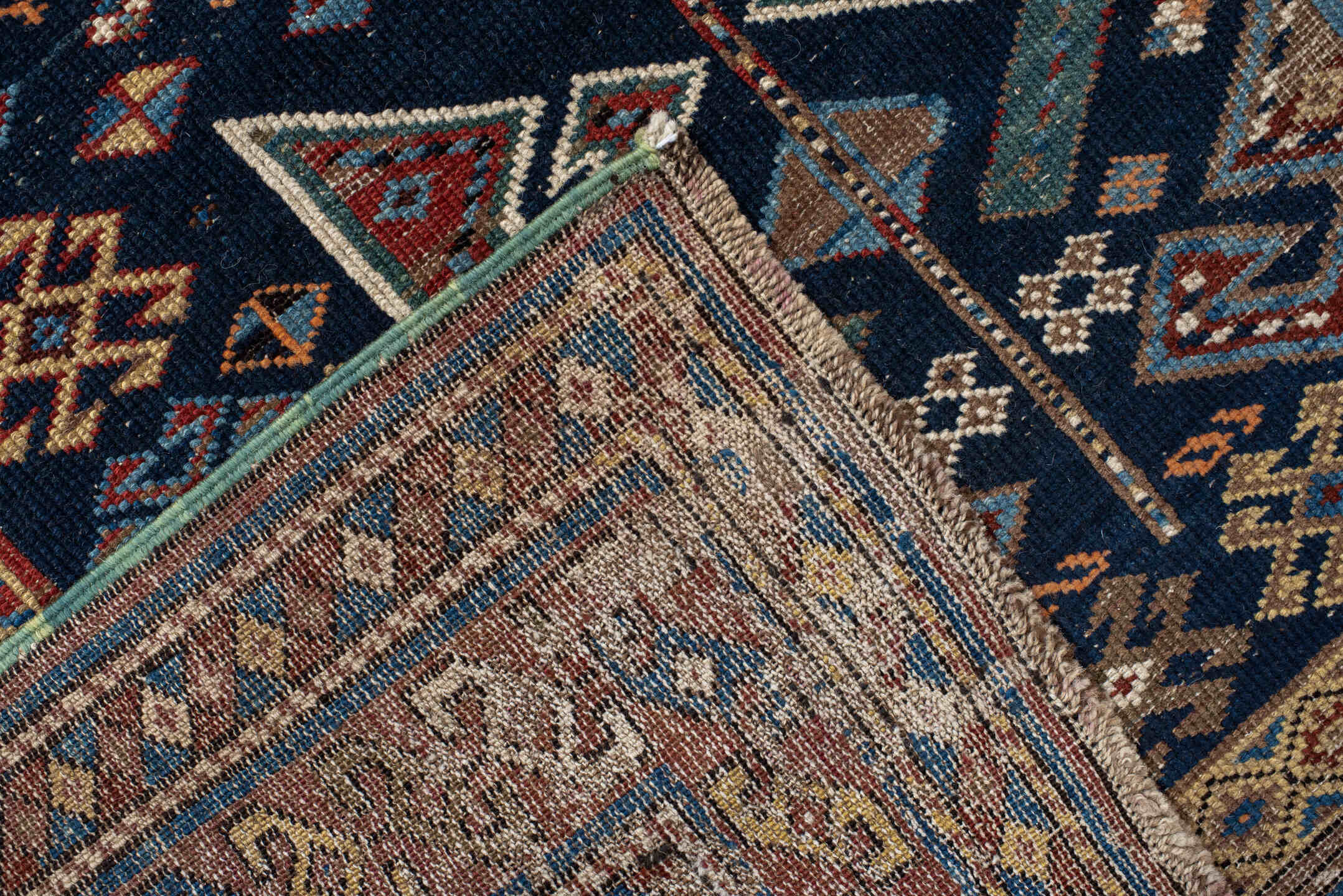 3' x 9' one-of-a-kind handmade vintage Shirvan runner rug. Color palette: navy, camel, ivory, sky blue, taupe, rust, sage