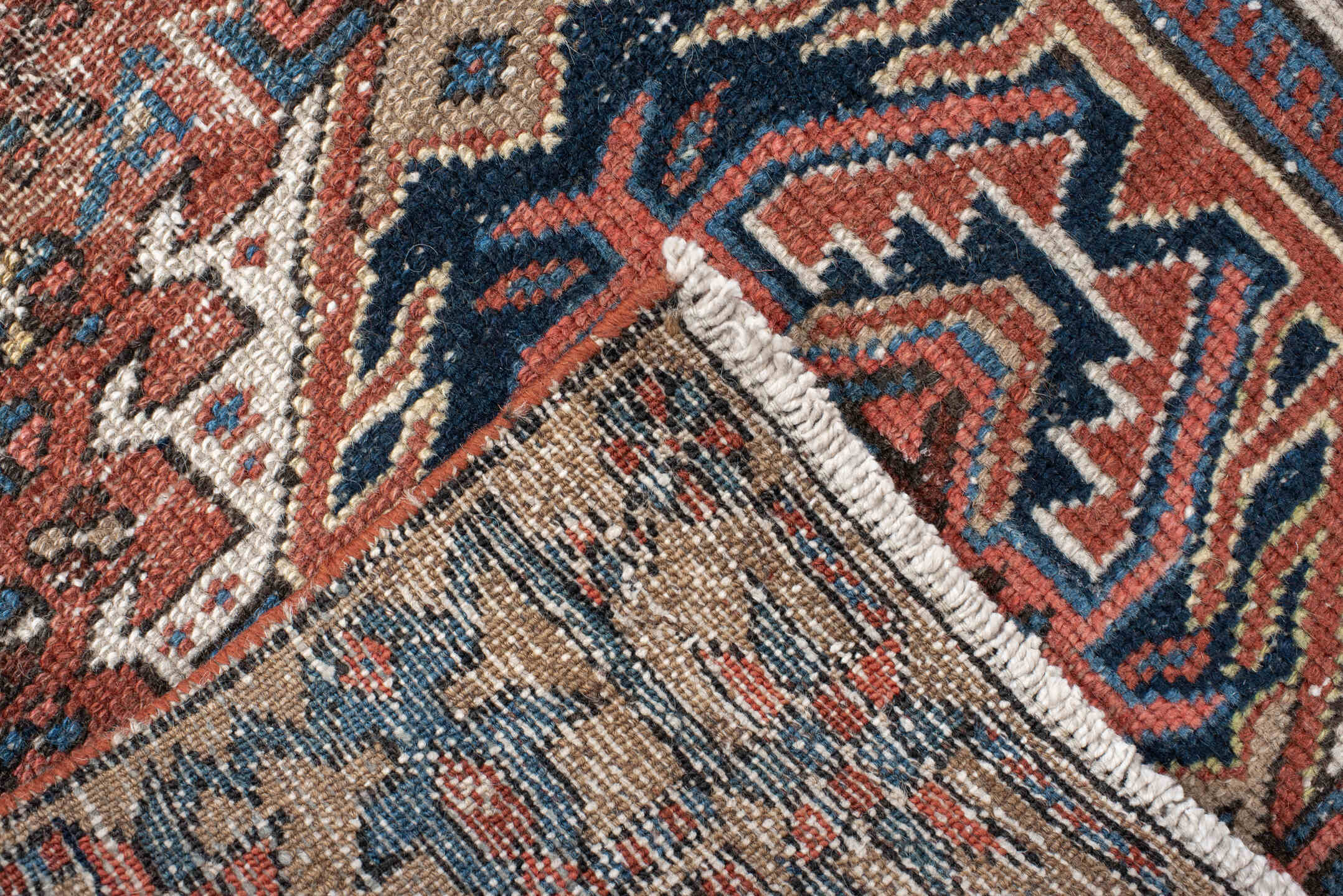 2' x 10' one-of-a-kind handmade vintage Karaje runner rug. Color palette: rust, blue, ivory, navy, taupe, camel, charcoal