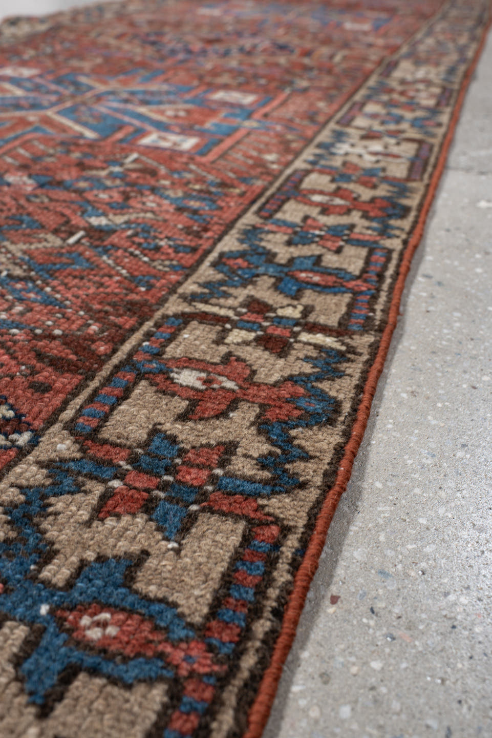 2' x 10' one-of-a-kind handmade vintage Karaje runner rug. Color palette: rust, blue, ivory, navy, taupe, camel, charcoal