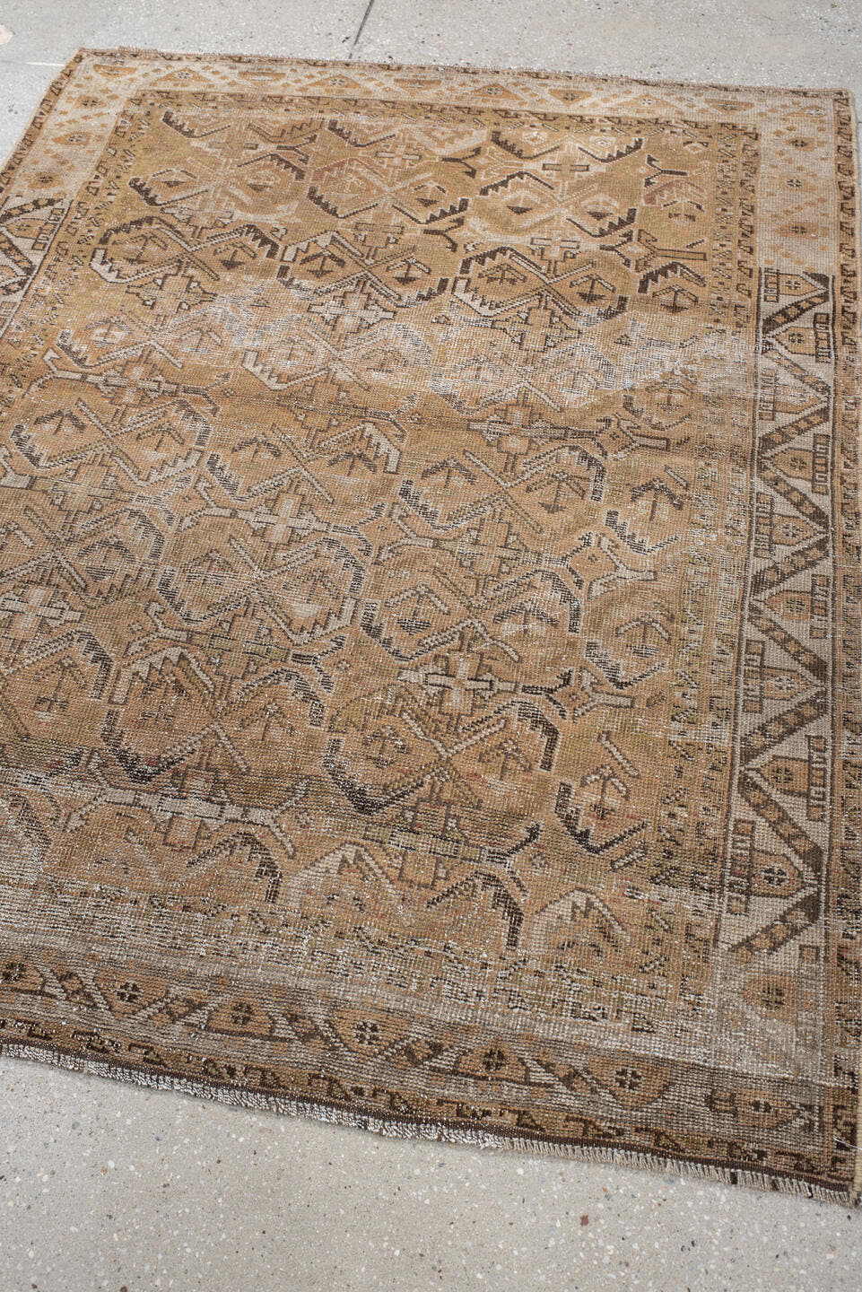 4' x 5' one-of-a-kind handmade vintage Afshar small size rug. Color palette: camel, taupe, ivory, brown, beige, gray