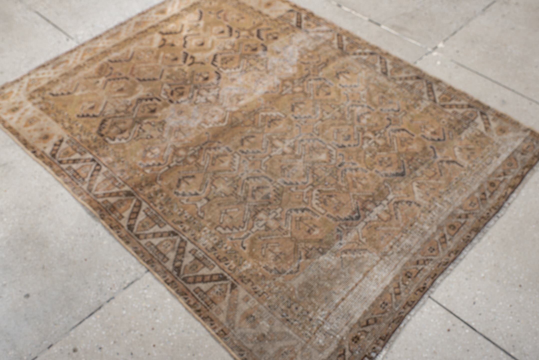4' x 5' one-of-a-kind handmade vintage Afshar small size rug. Color palette: camel, taupe, ivory, brown, beige, gray