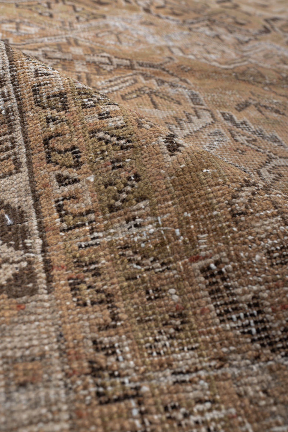4' x 5' one-of-a-kind handmade vintage Afshar small size rug. Color palette: camel, taupe, ivory, brown, beige, gray