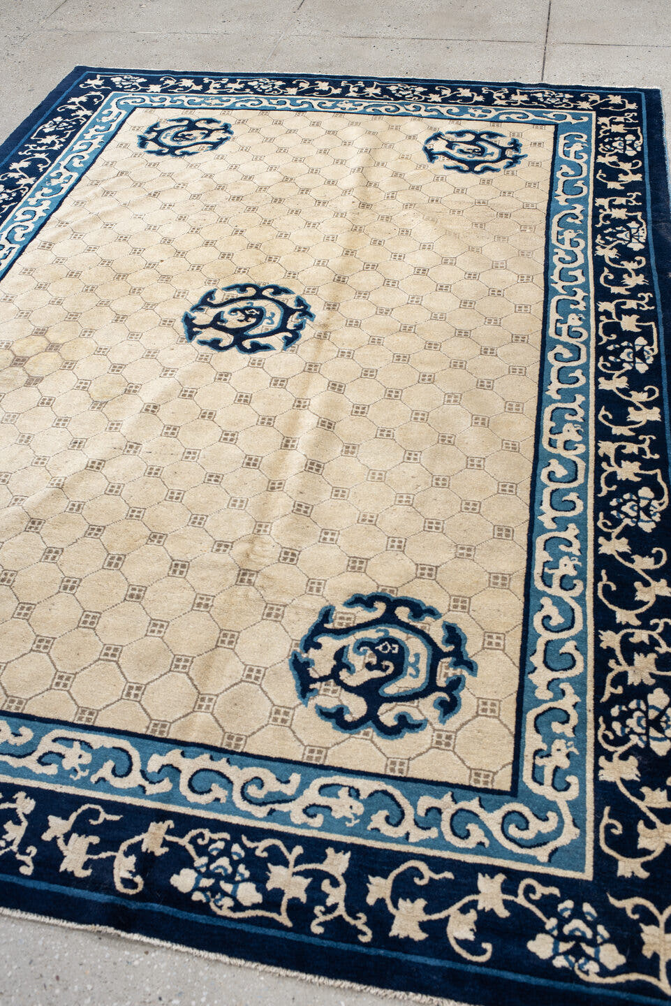 6' x 9' one-of-a-kind handmade antique Chinese medium size rug. Color palette: ivory, navy, sky_blue, slate, cream, blue