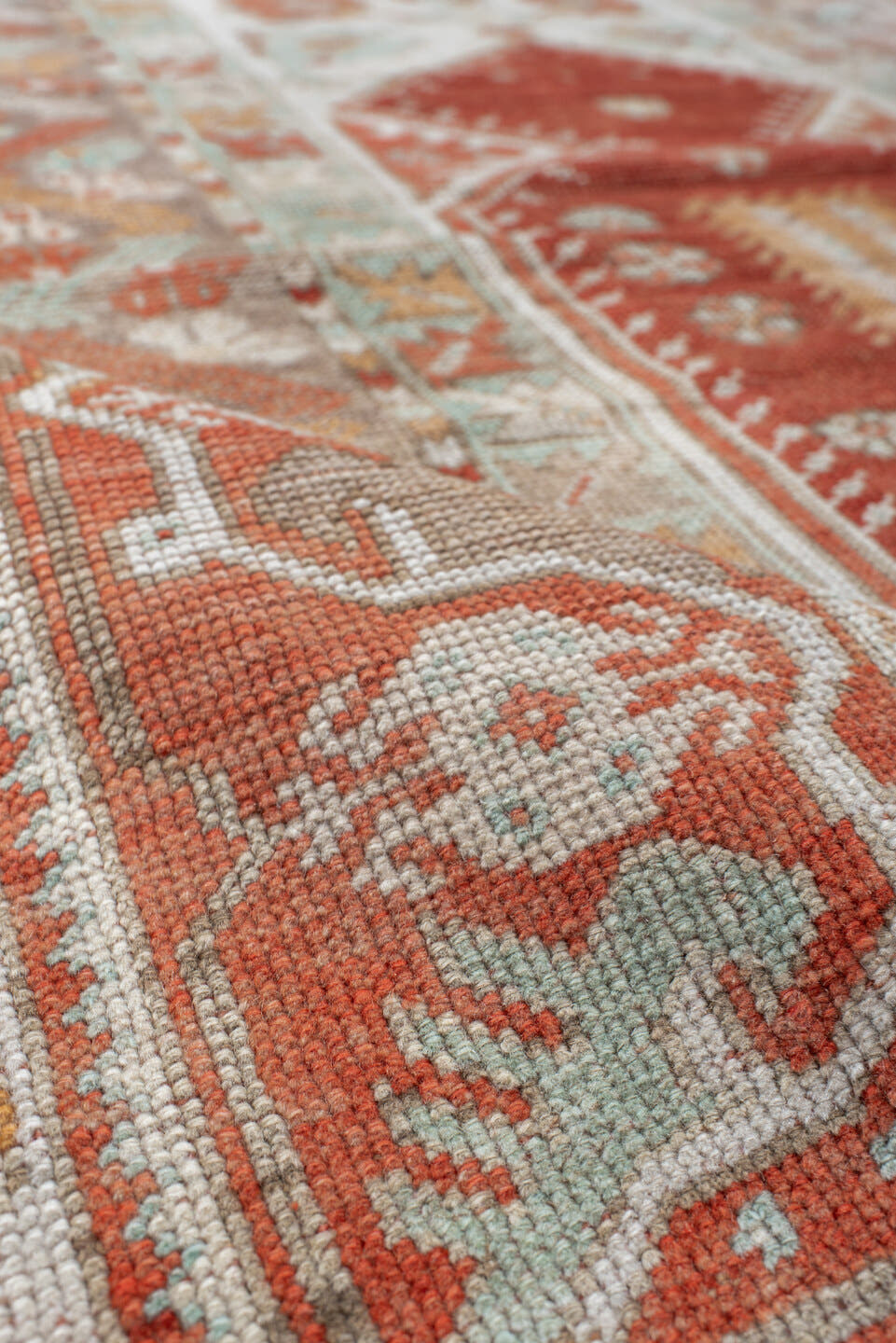 4' x 5' one-of-a-kind handmade vintage Anatolian small size rug. Color palette: terra cotta, ivory, pale aqua, sand, rust